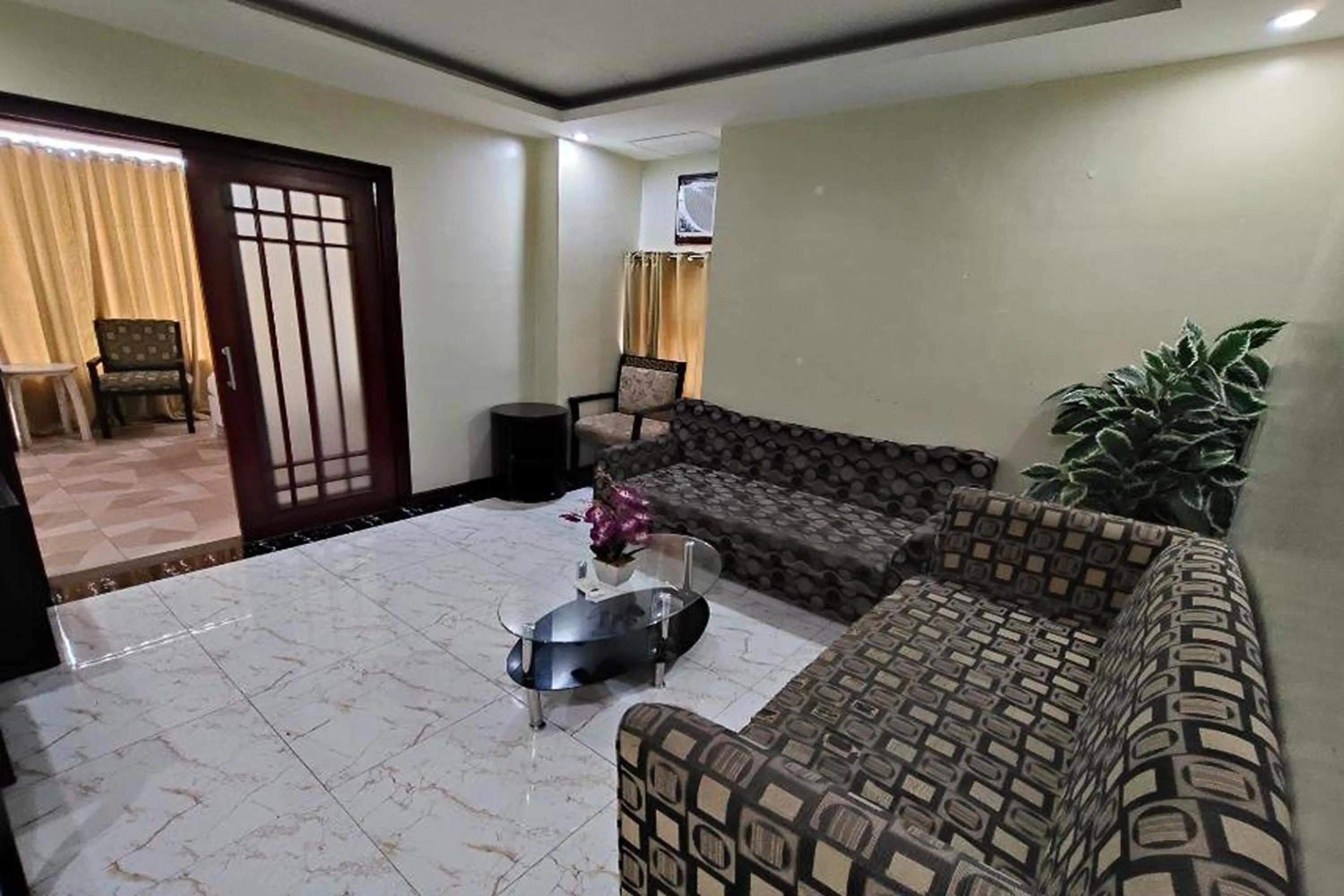 Seating area in Manila Crown Palace Hotel