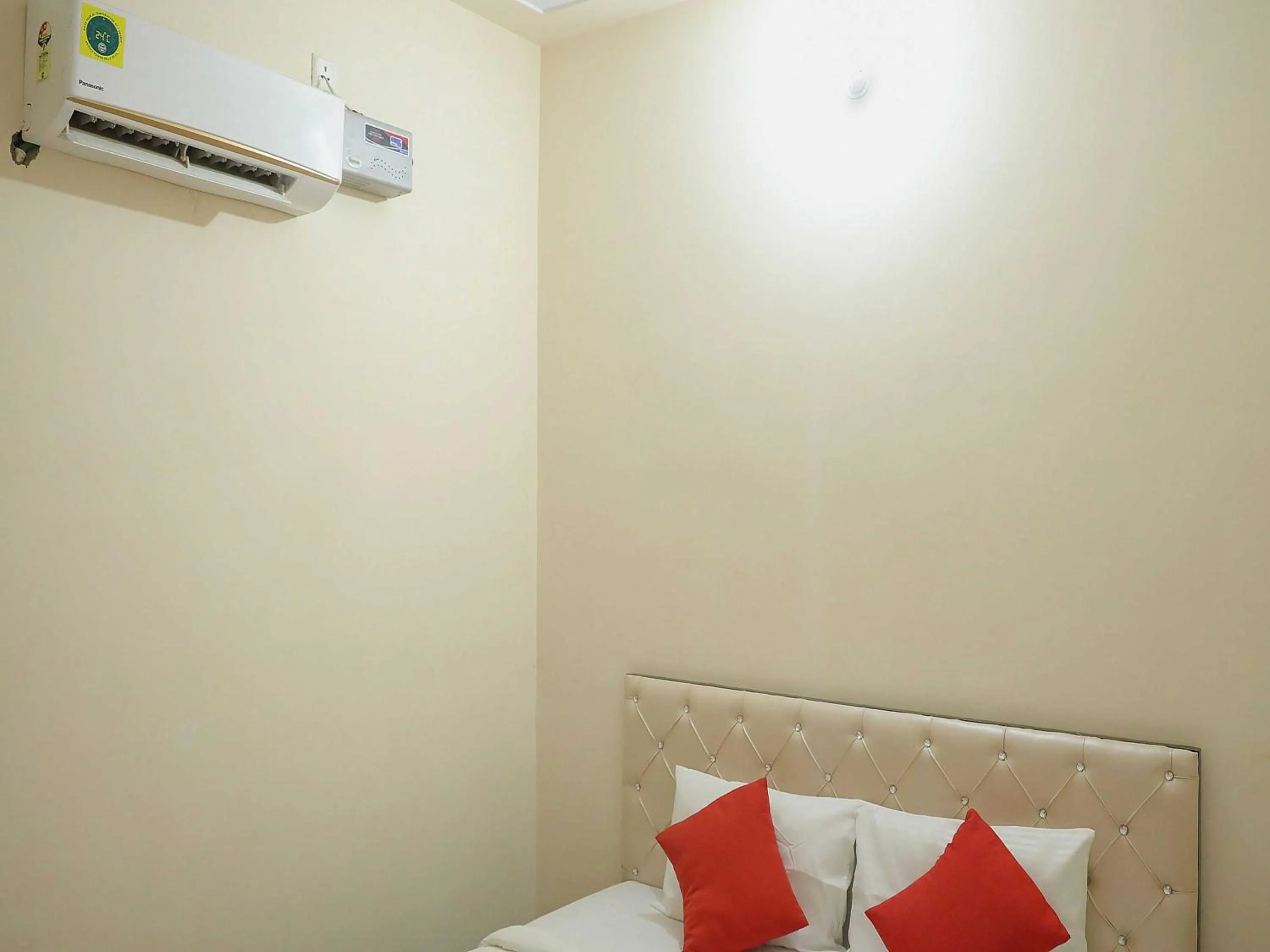 Bedroom in Hotel O Hmi International