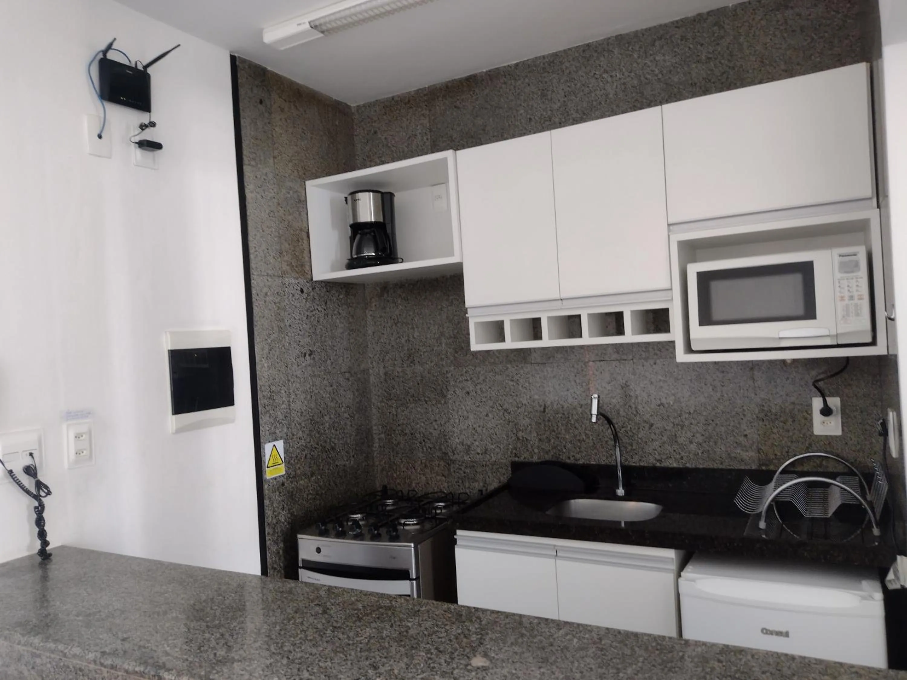 Communal kitchen in Via Venetto Flat próximo a feirinha da beira-mar Fortaleza