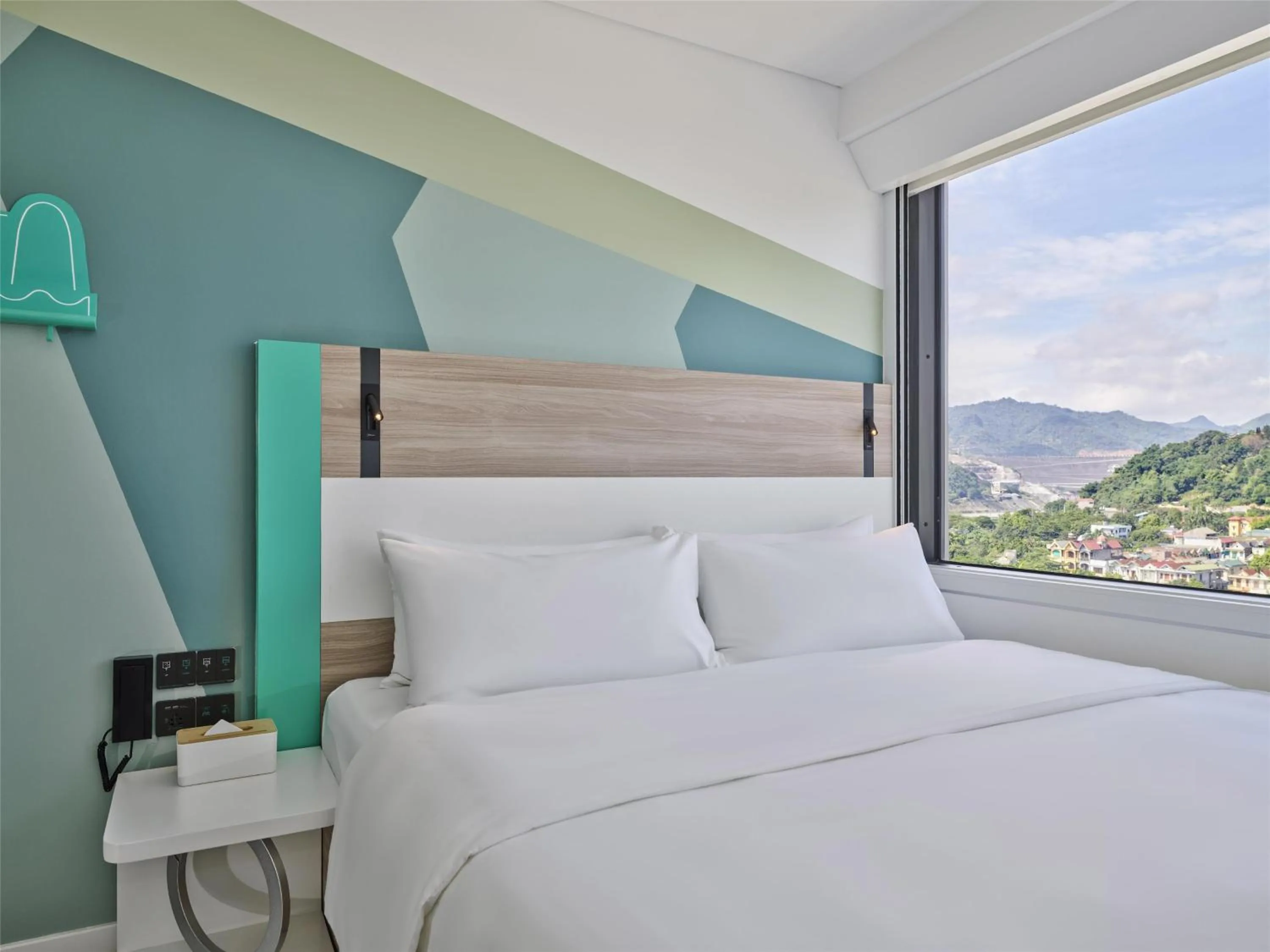 Bed in Tru by Hilton Hoa Binh City Centre