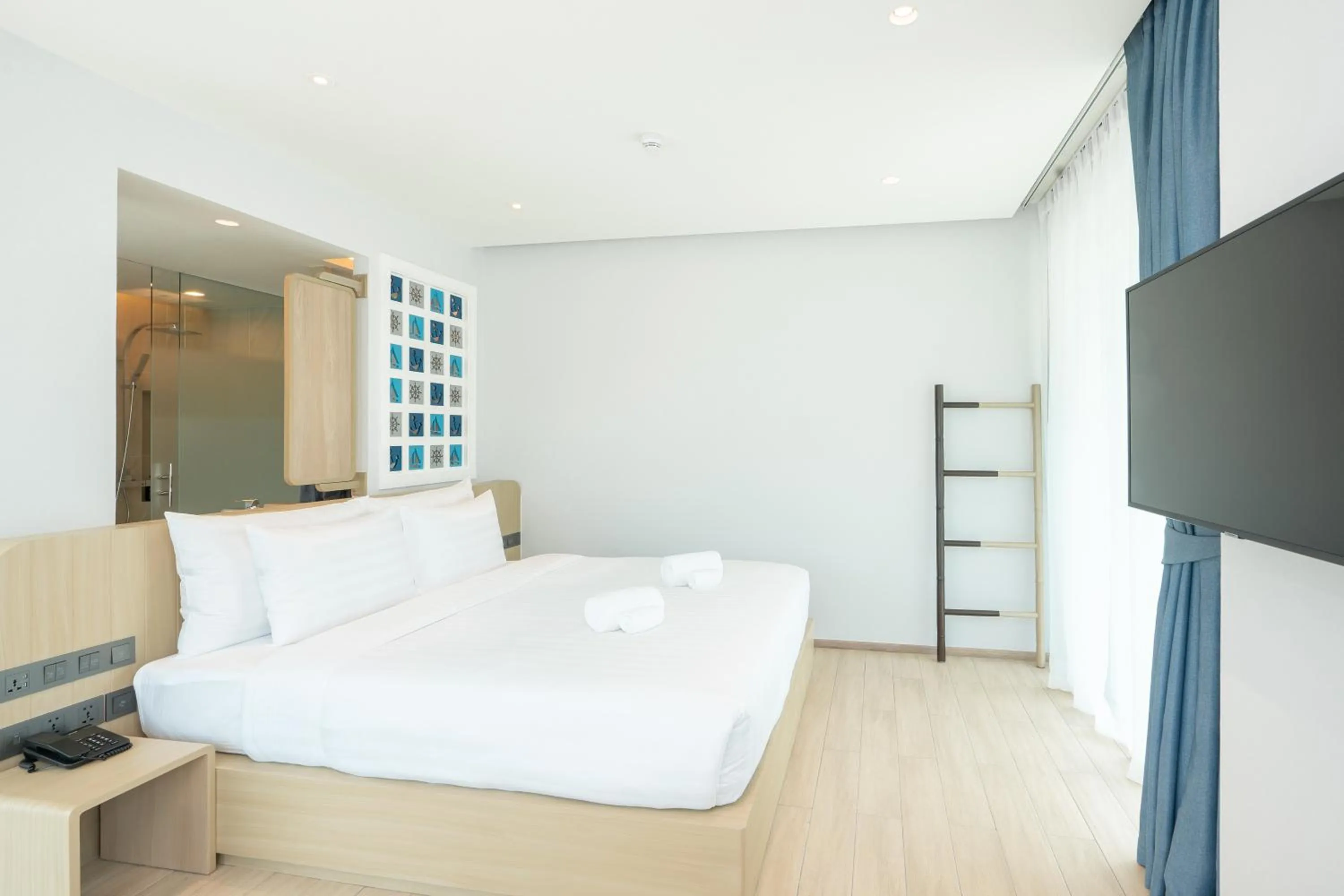 Bed in Panwaburi Beachfront Resort - SHA Extra Plus