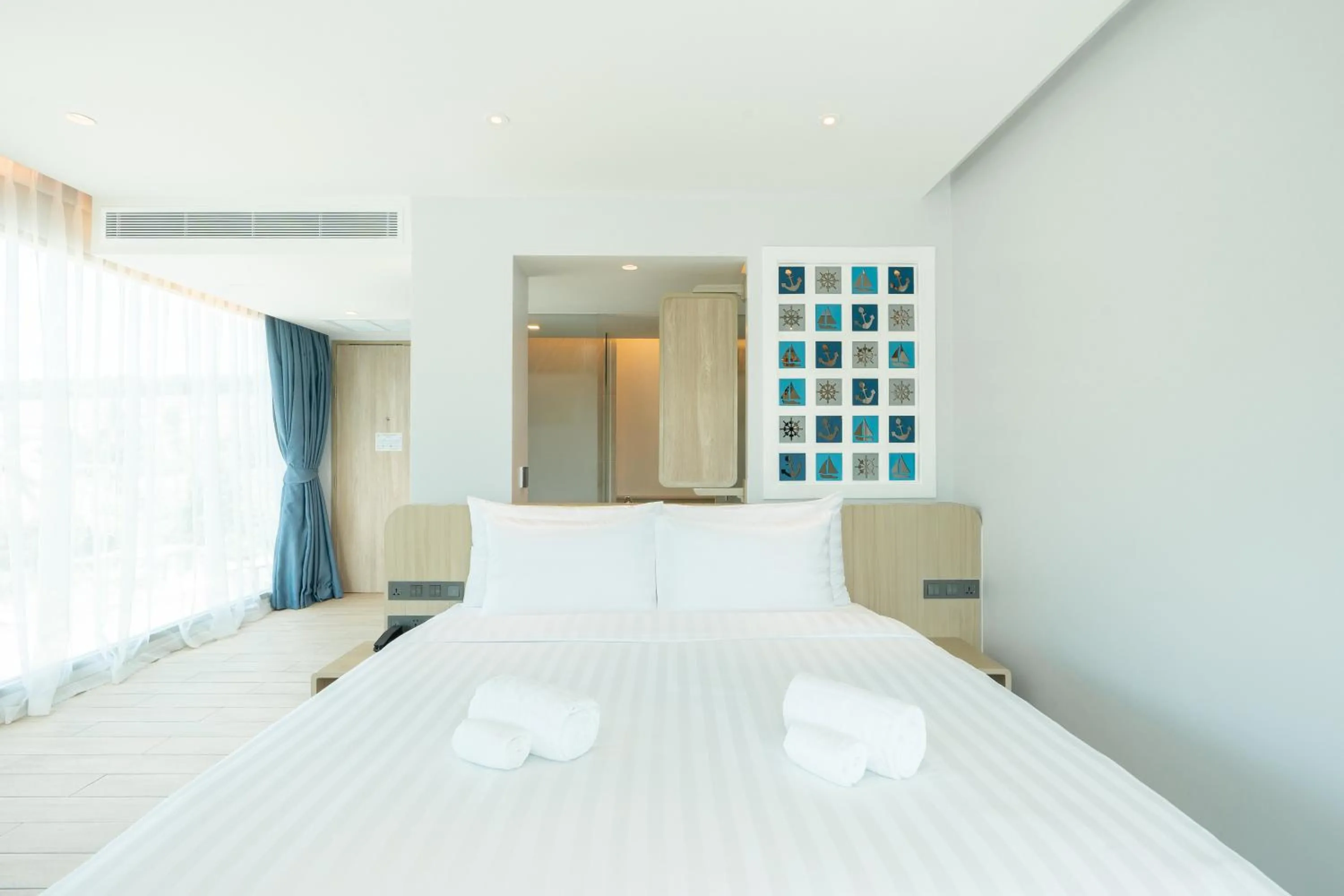 Bed in Panwaburi Beachfront Resort - SHA Extra Plus