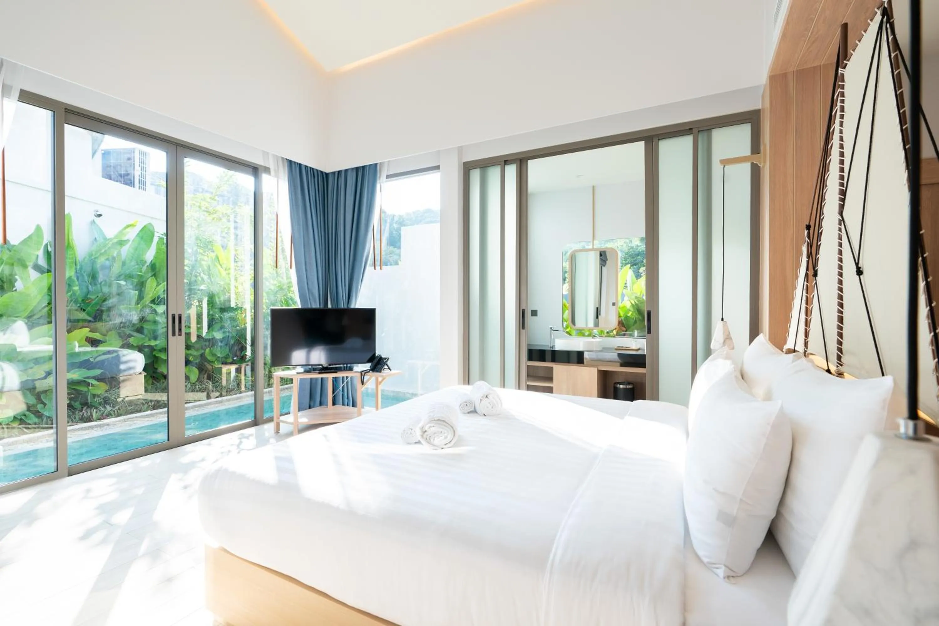 Bed in Panwaburi Beachfront Resort - SHA Extra Plus