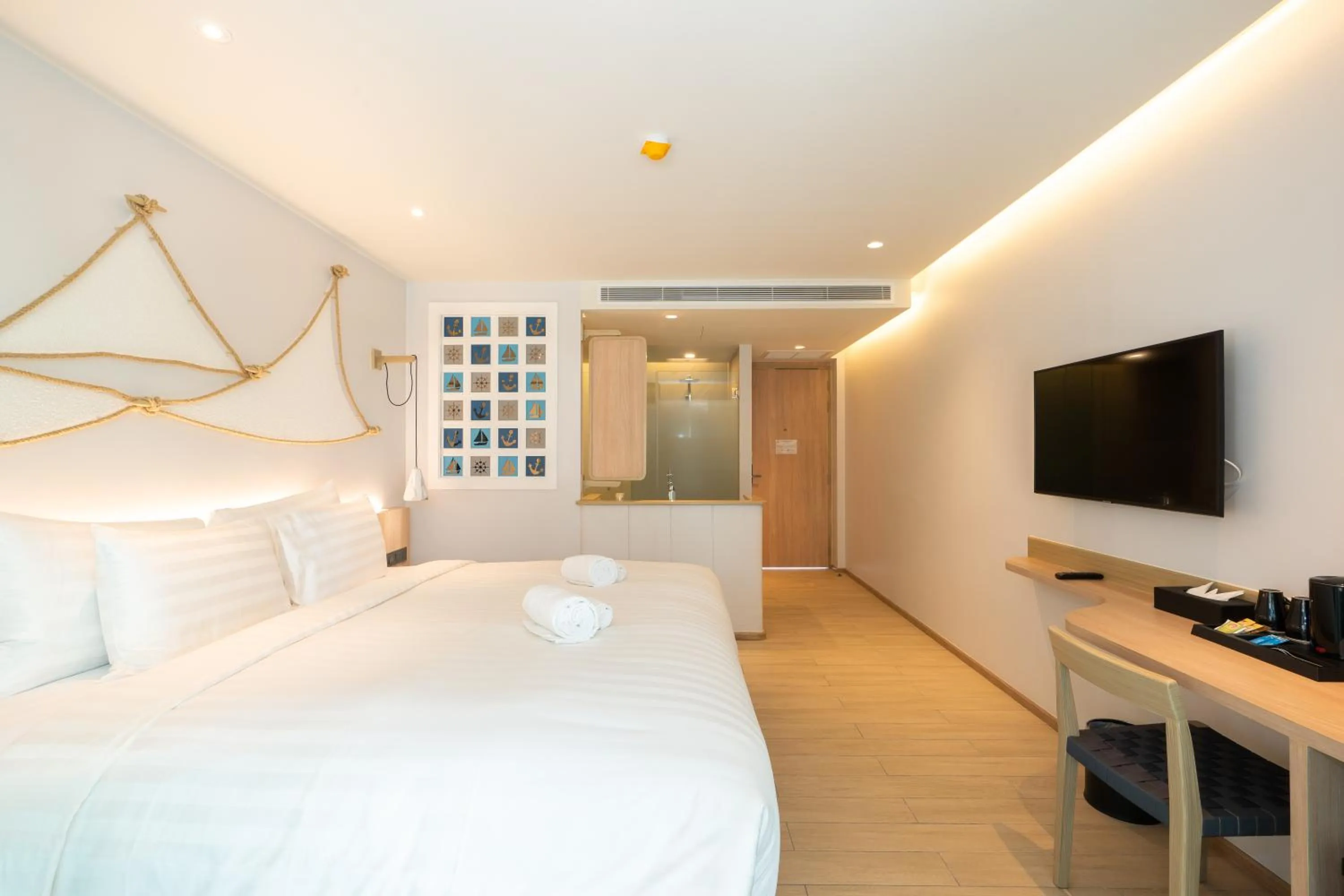 Bed in Panwaburi Beachfront Resort - SHA Extra Plus