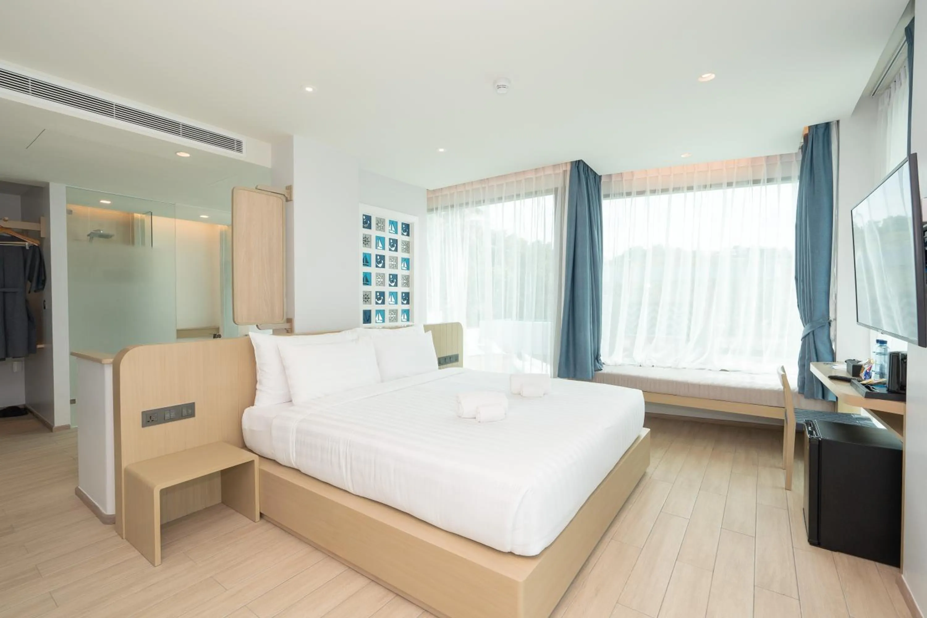 Bed in Panwaburi Beachfront Resort - SHA Extra Plus