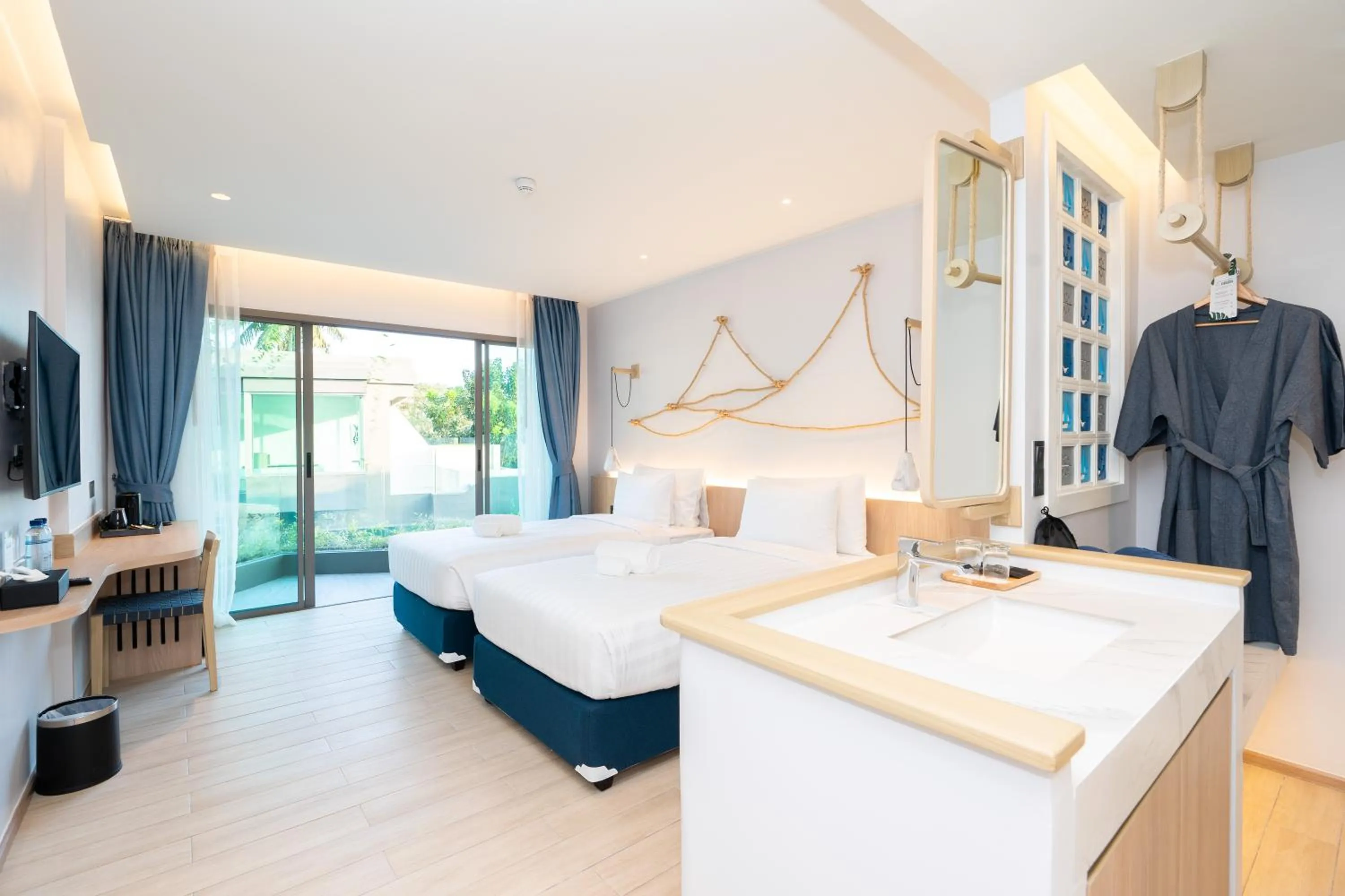 Bed in Panwaburi Beachfront Resort - SHA Extra Plus