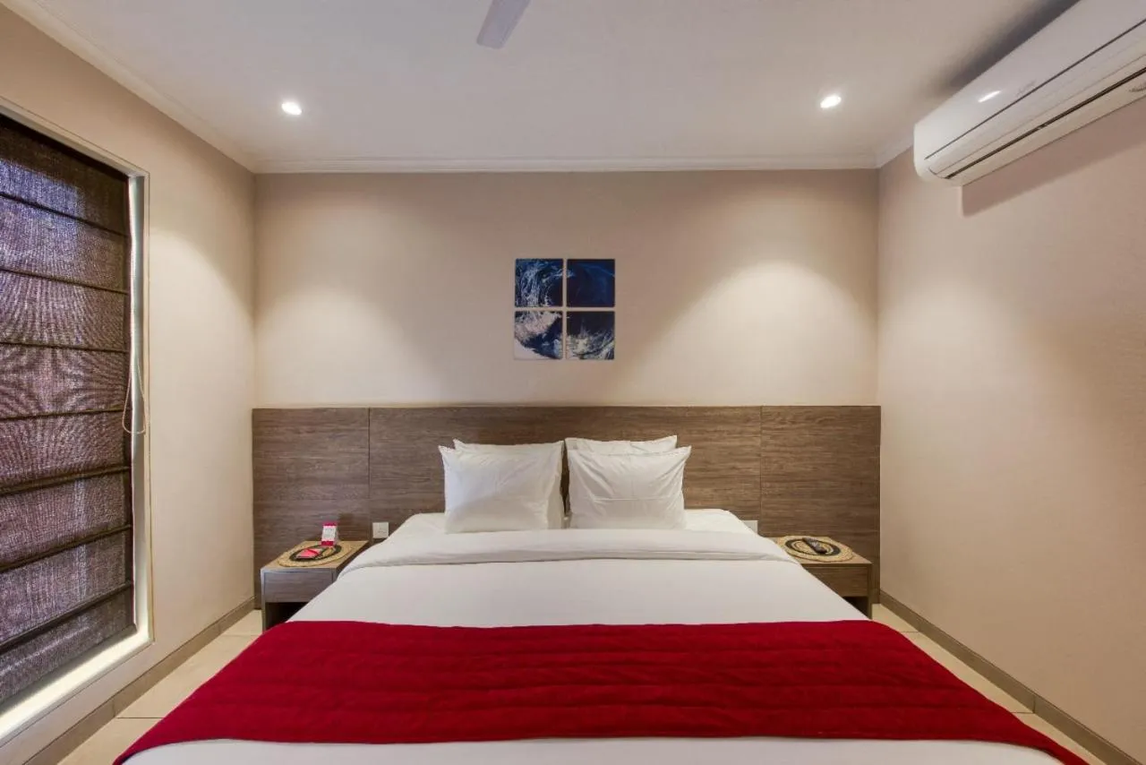 Photo of the whole room, Bed in ROSASTAYS Gurugram Golf Course