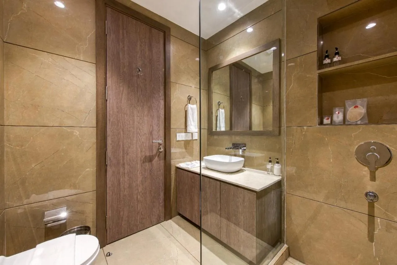 Bathroom in ROSASTAYS Gurugram Golf Course
