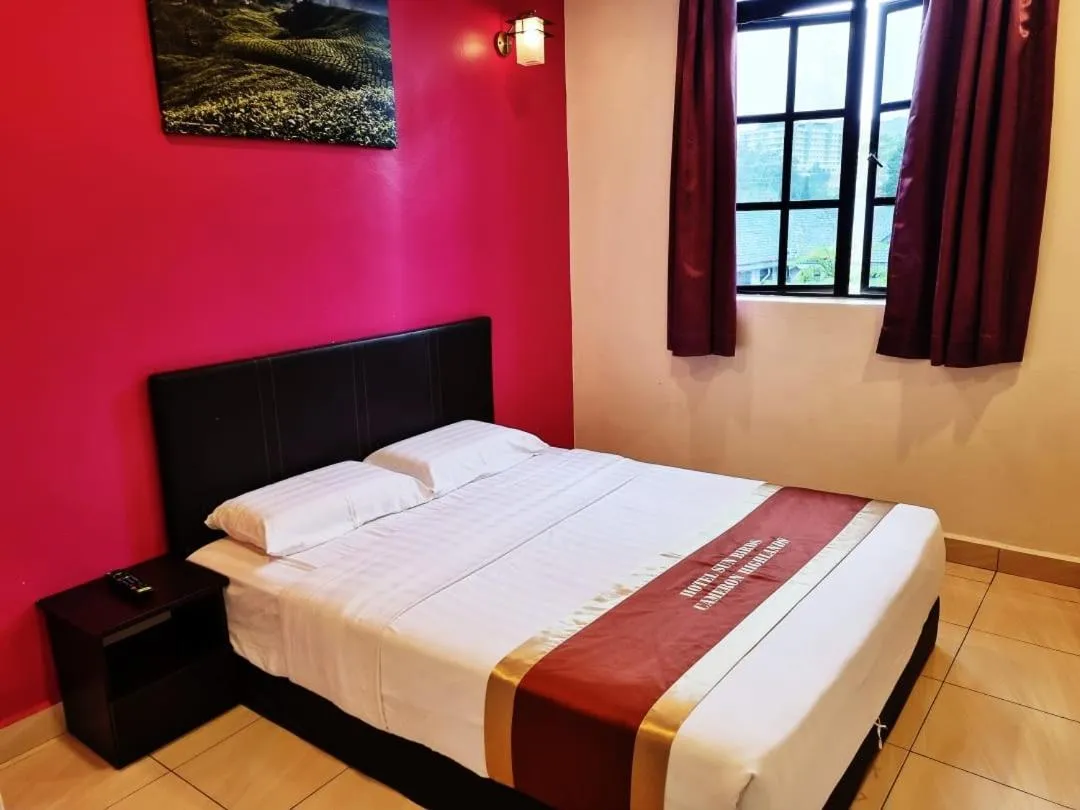 Bed in Hotel Sun Birds