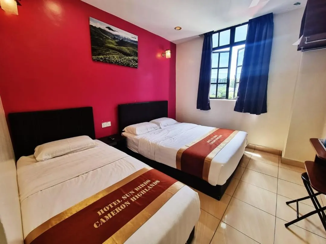 Bed in Hotel Sun Birds