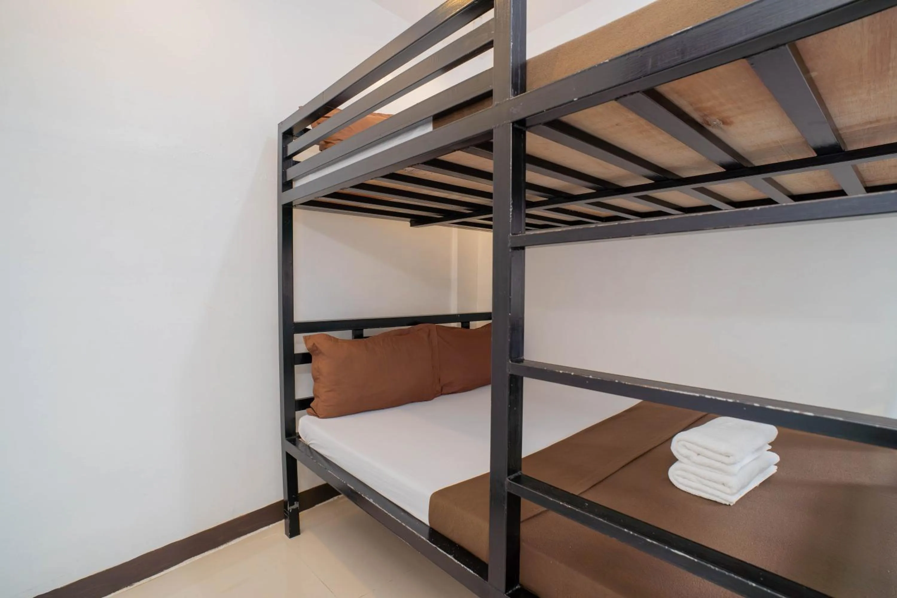 Bed in Prim Travellers Inn