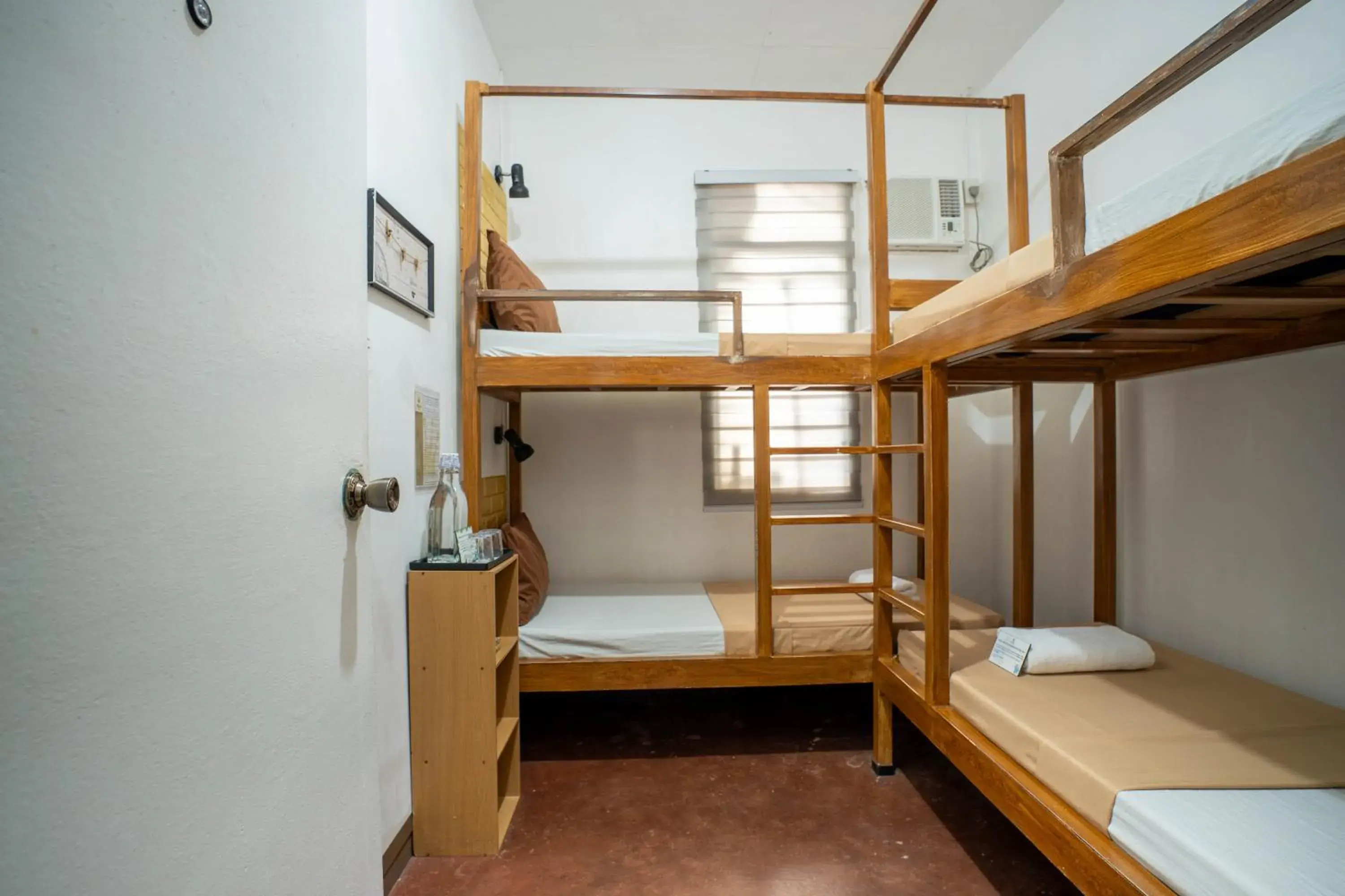 Quadruple Room with Shared Bathroom in Prim Travellers Inn Quadruple Room with Shared Bathroom in Prim Travellers Inn