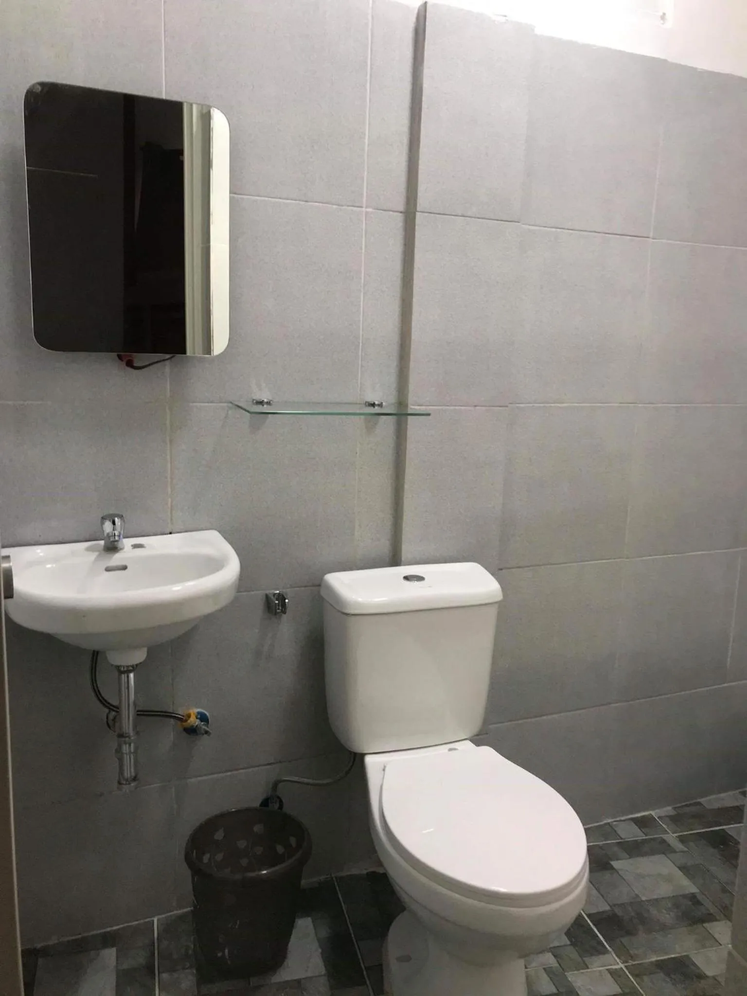 Toilet in Prim Travellers Inn