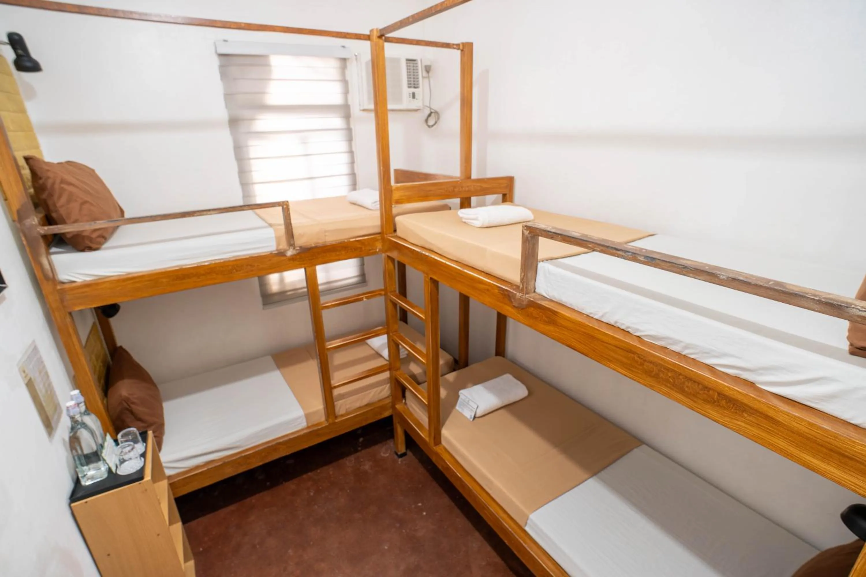 Bed in Prim Travellers Inn