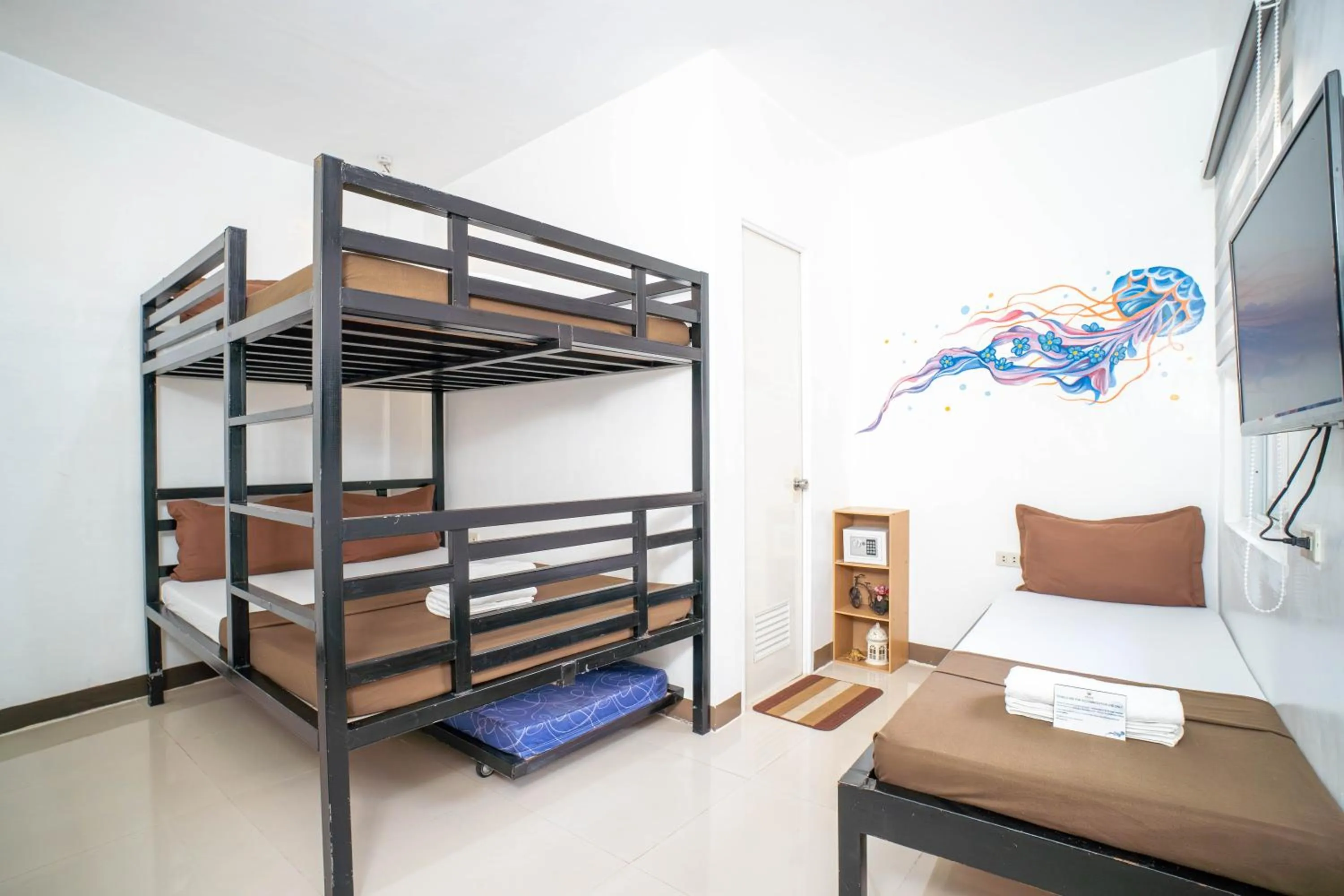 Bed in Prim Travellers Inn