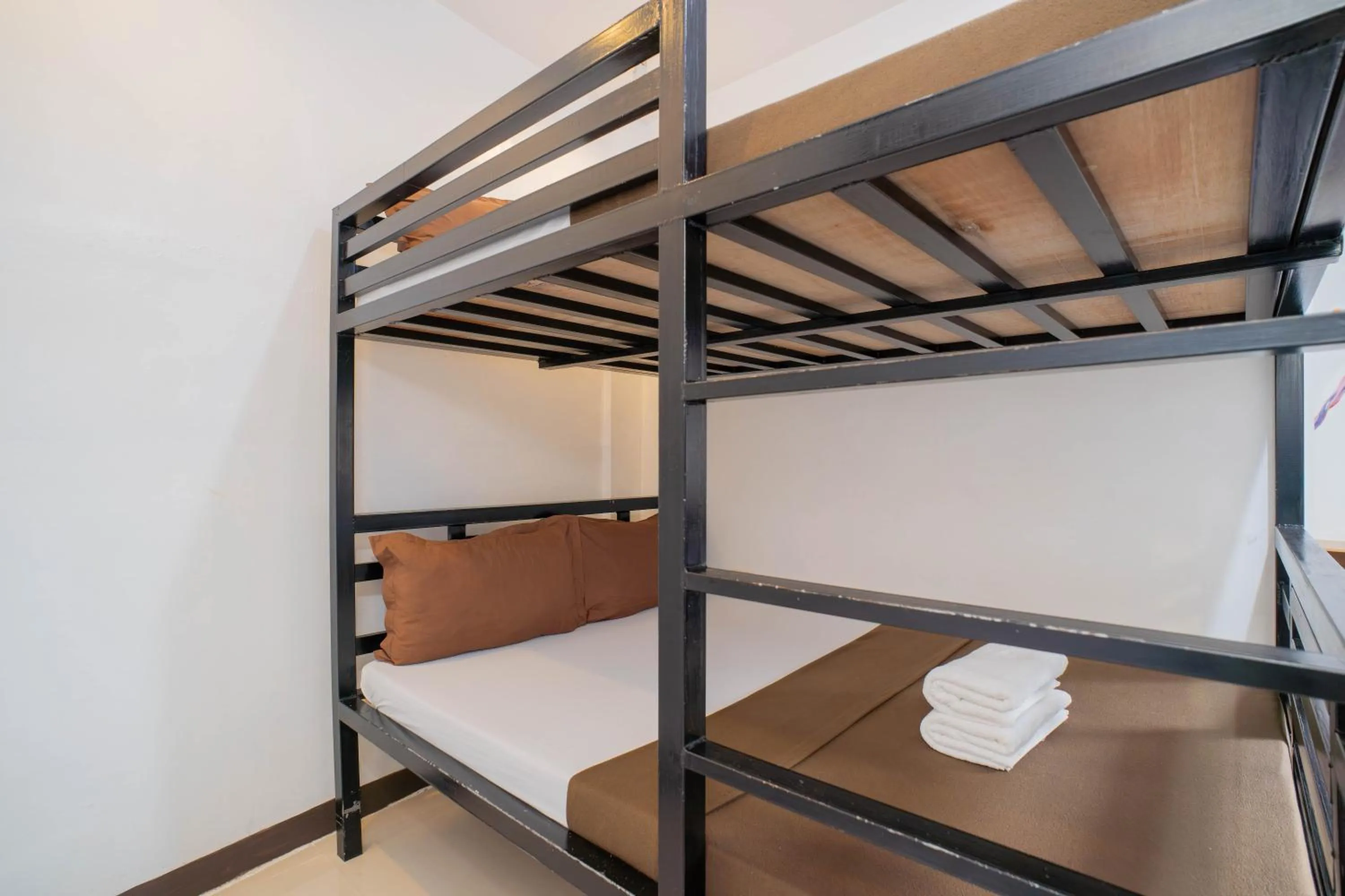 Bed in Prim Travellers Inn