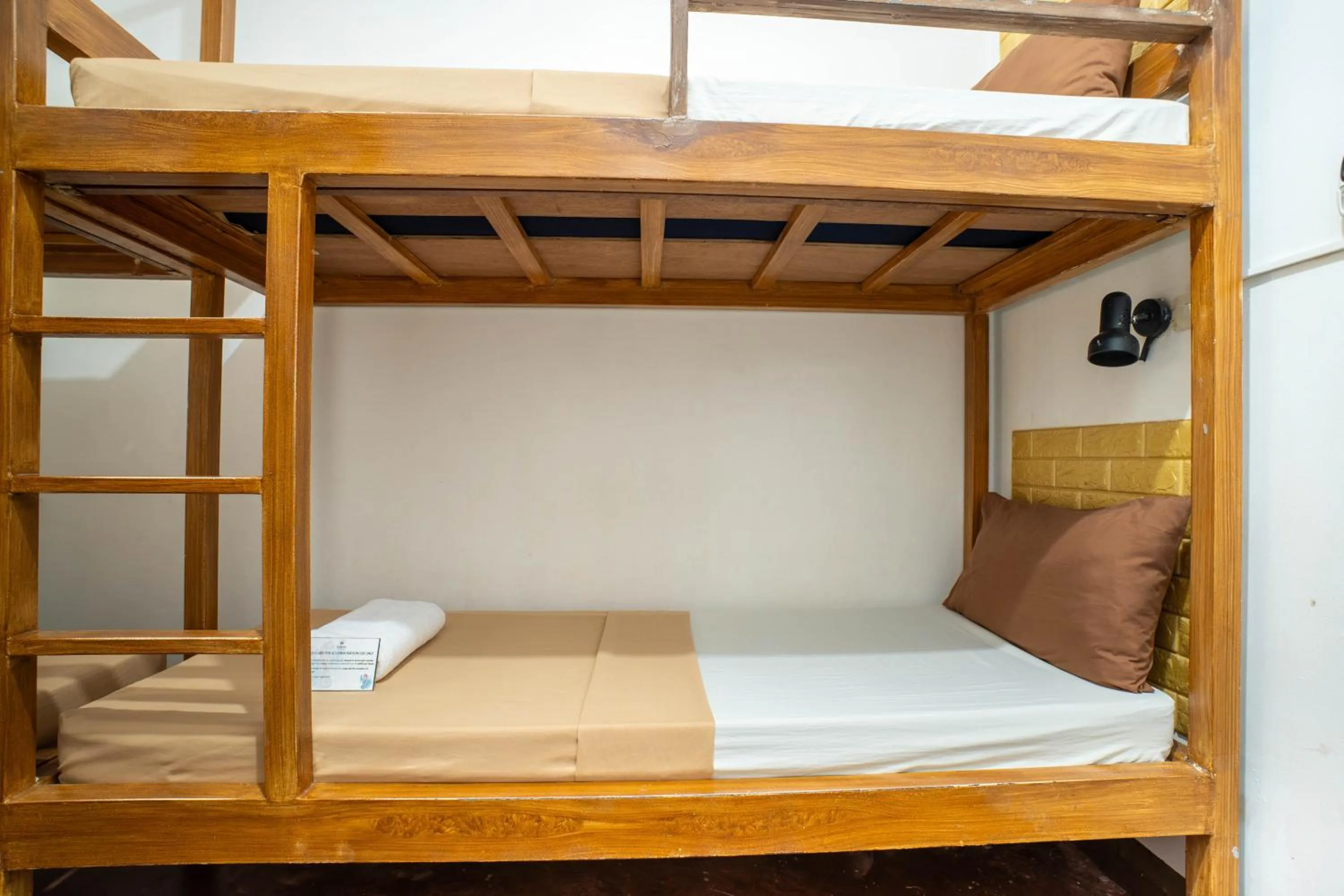 Bed in Prim Travellers Inn