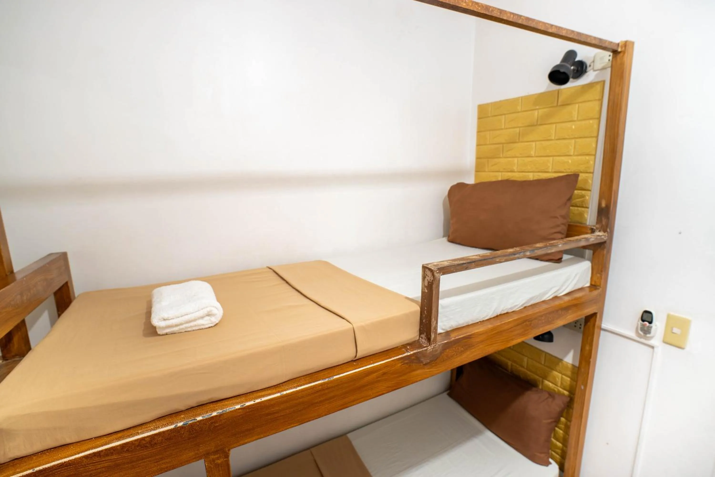 Bed in Prim Travellers Inn