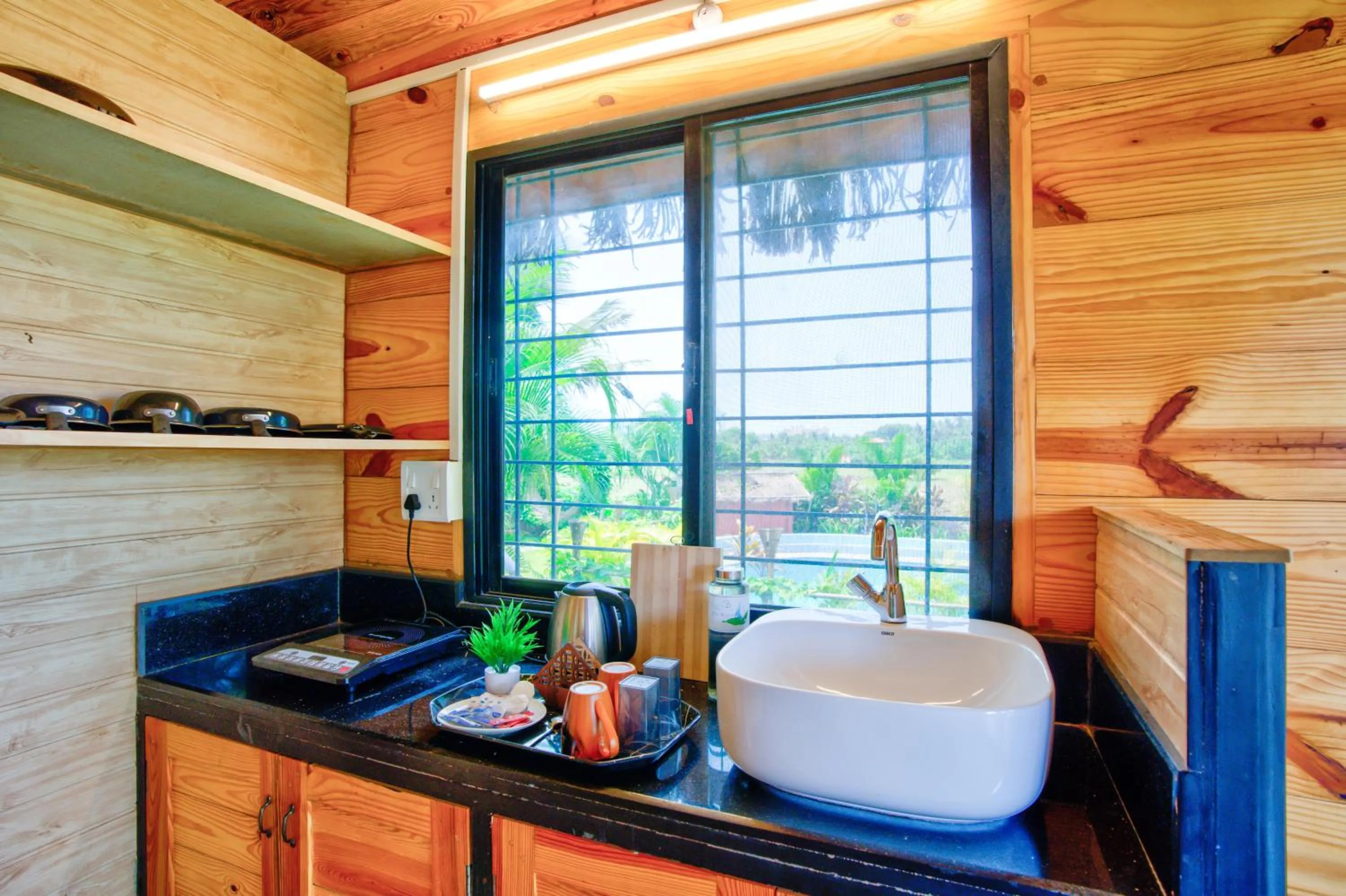 Kitchen or kitchenette in The Lazy Cabanas