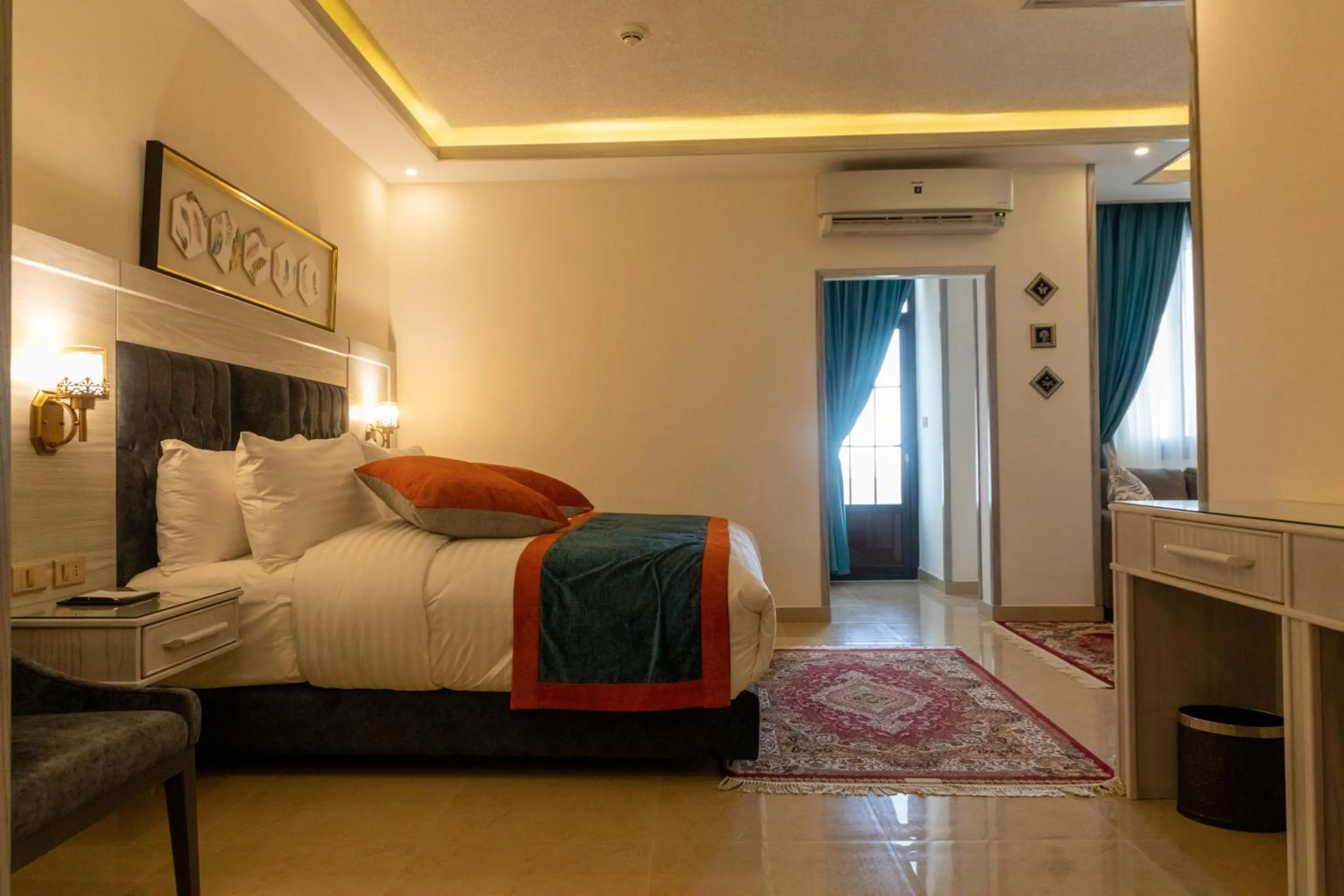 Living room, Bed in Petra Canyon Hotel