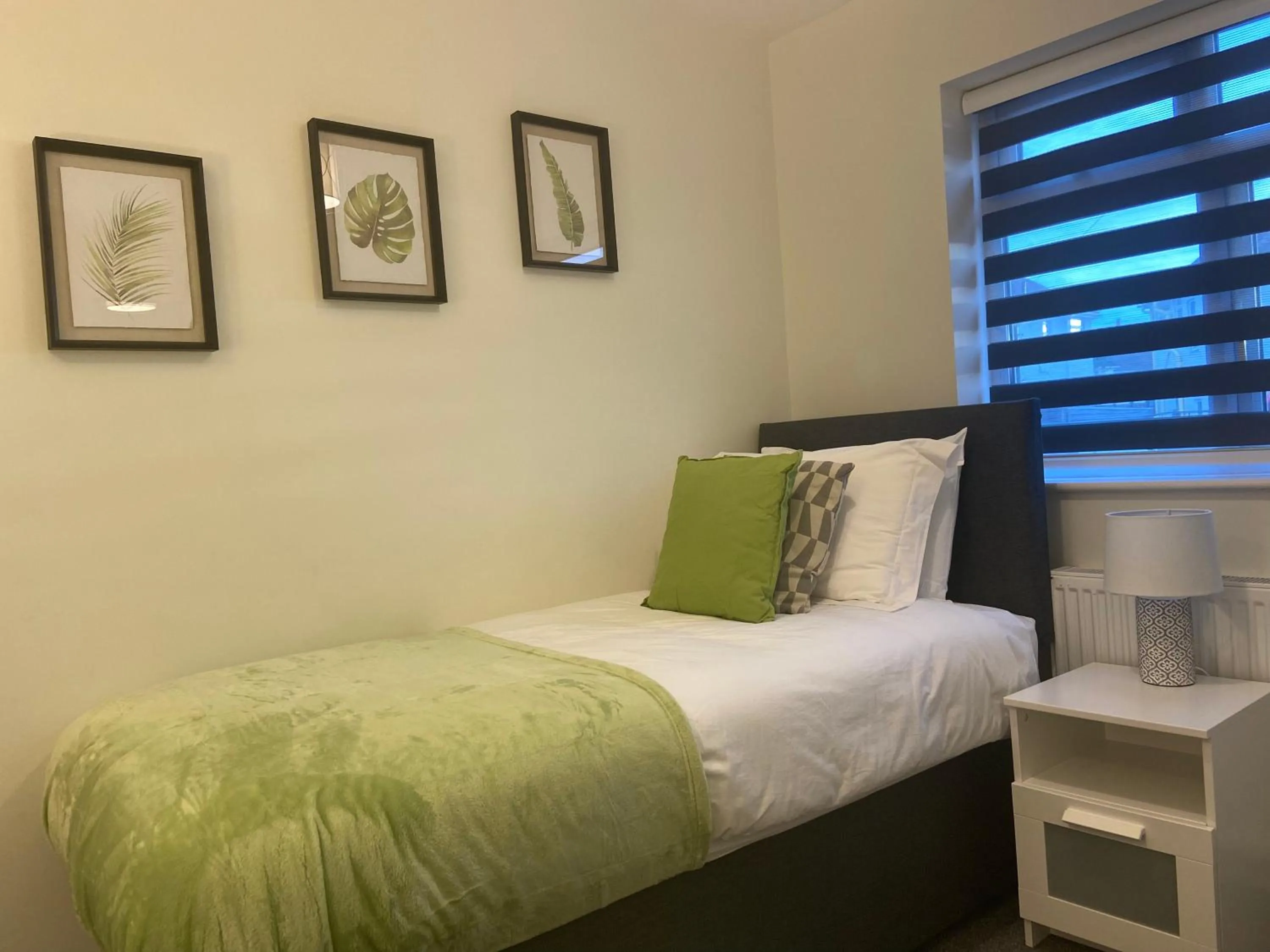 Bedroom in Gladstone Apartments by Bluebell Rooms