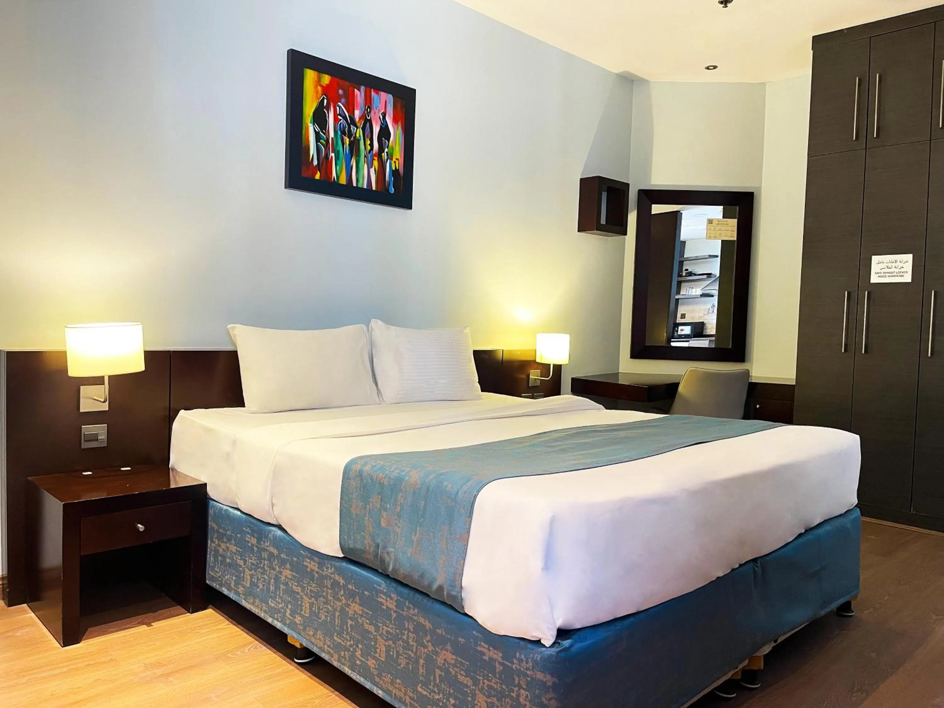 Bed in Signature Hotel Apartments and Spa