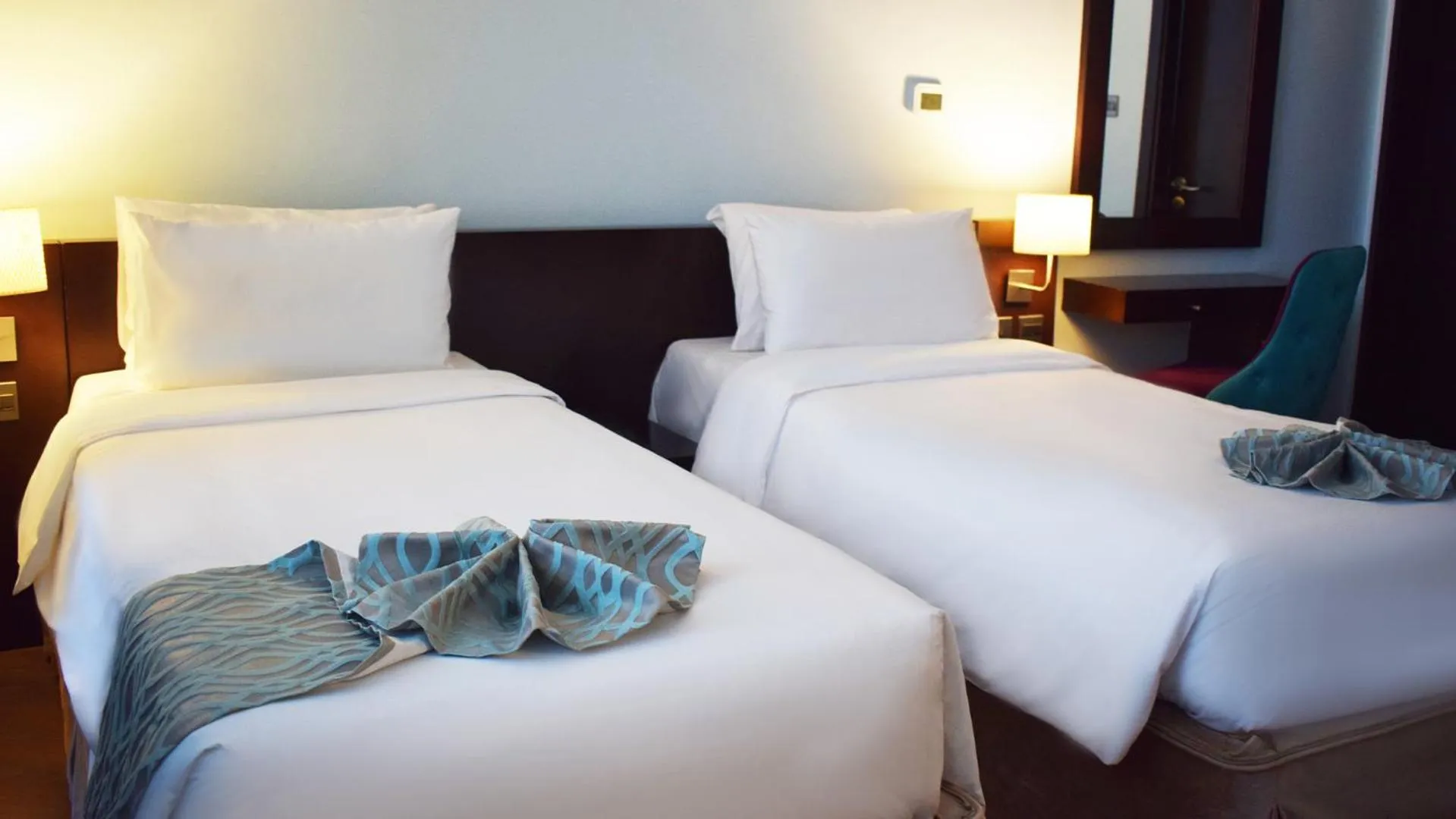 Bed in Signature Hotel Apartments and Spa