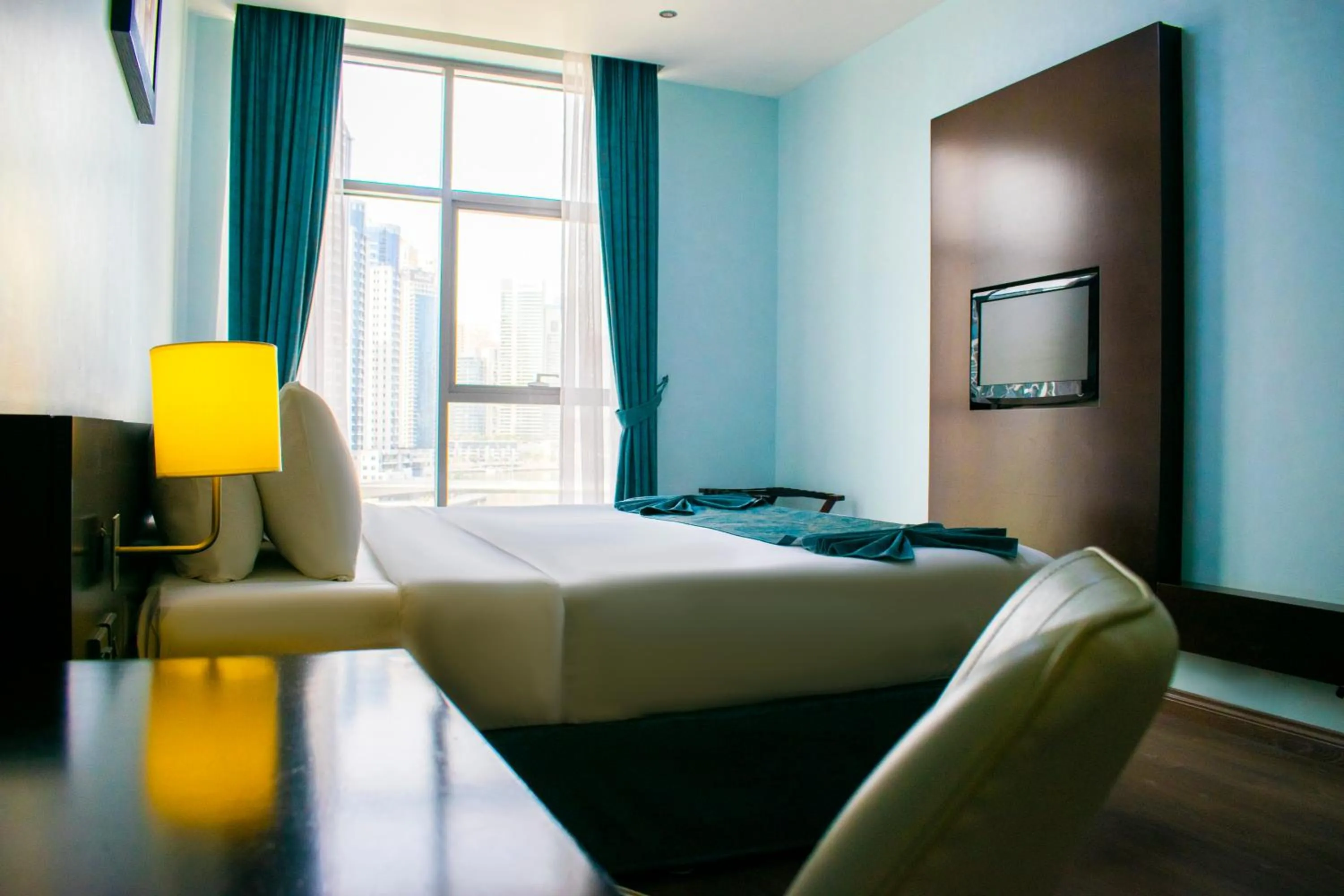 Bed in Signature Hotel Apartments and Spa