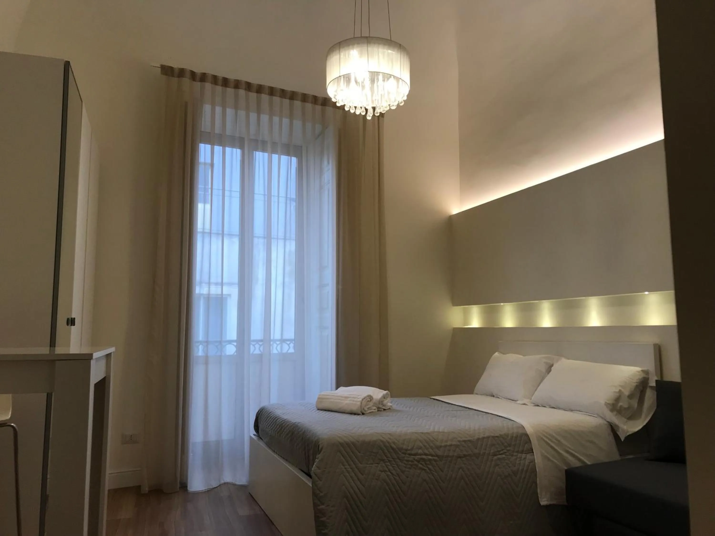 Photo of the whole room, Bed in Motta Palace Apartments & Rooms