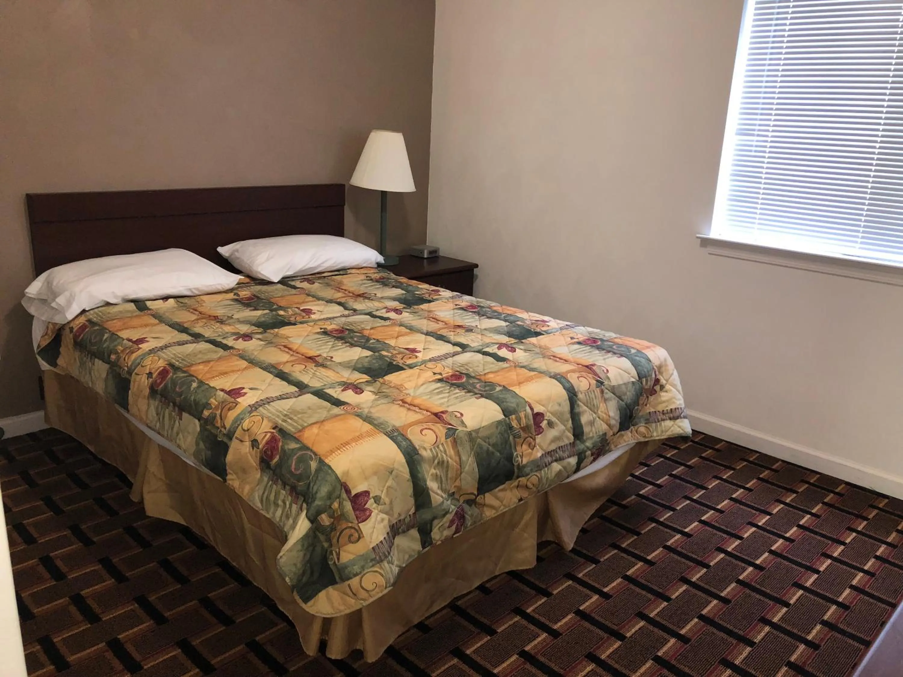Bed in Affordable Suites Burlington