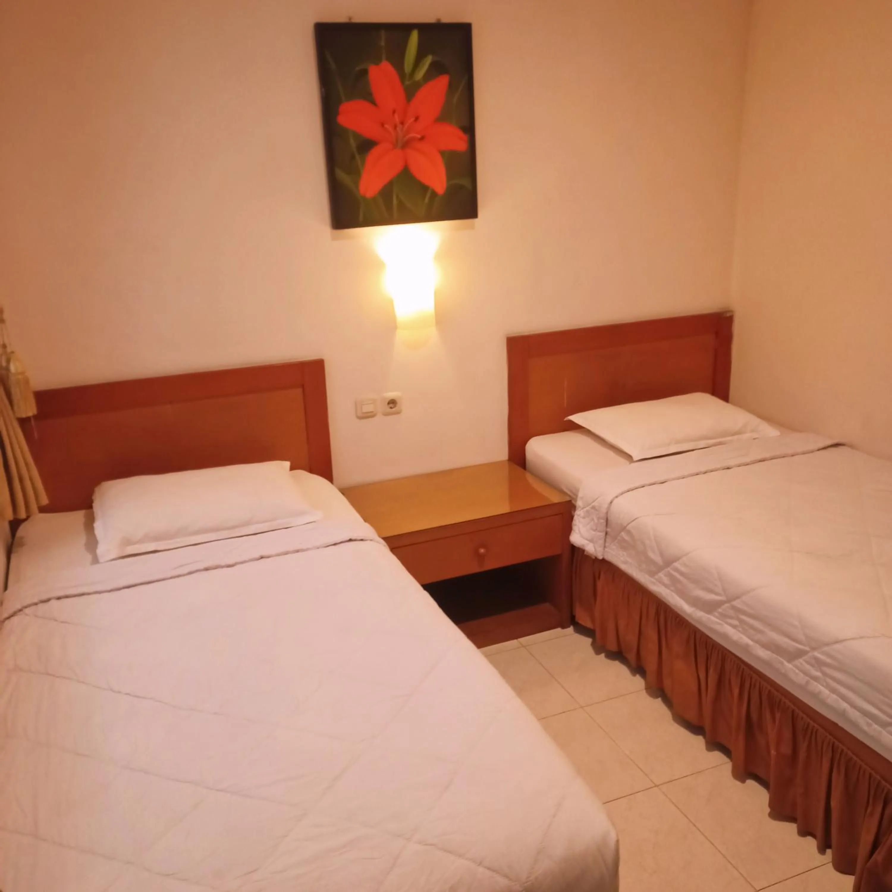 Bed in Hotel Flamboyan