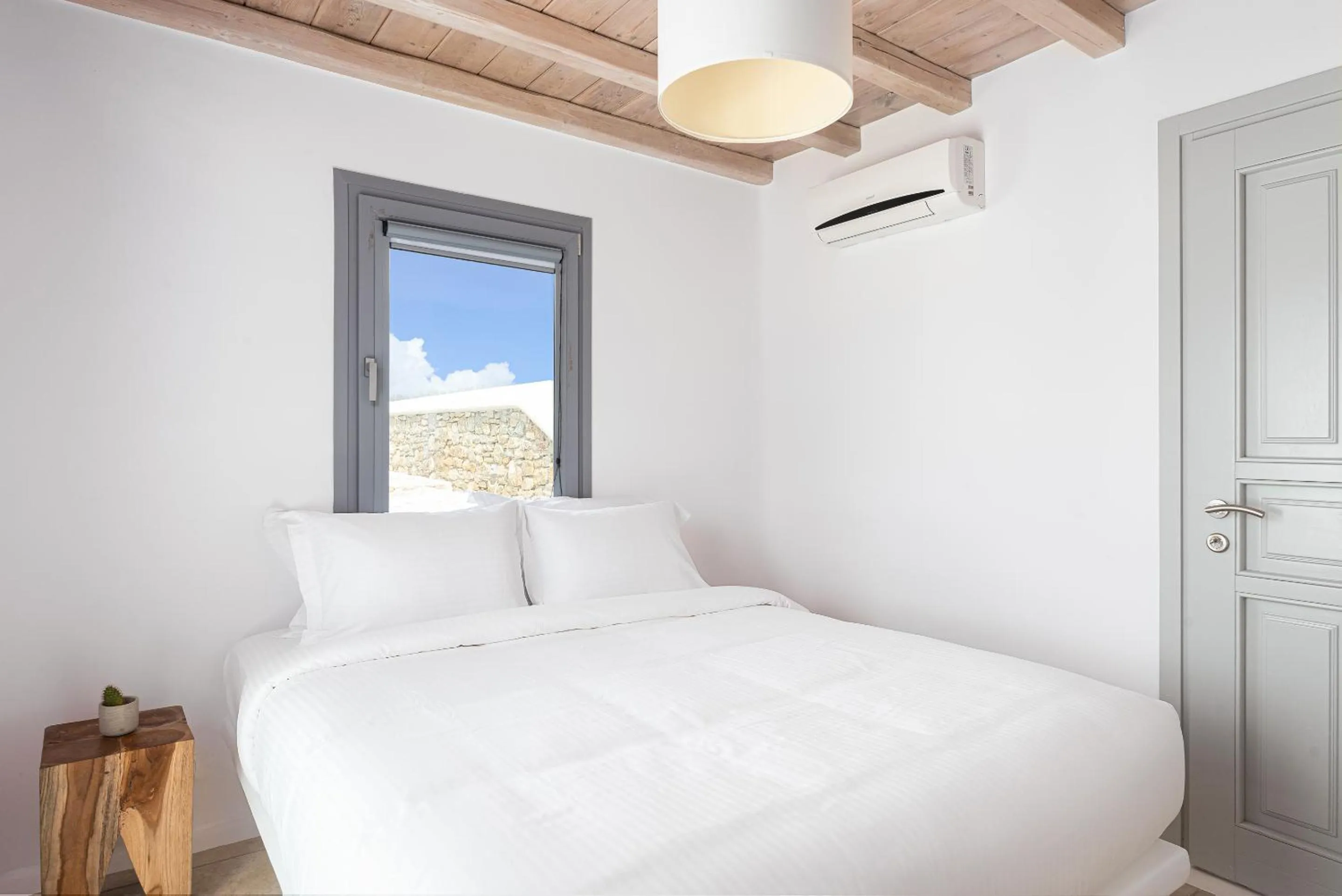 Bed in Koumi Homes Mykonos
