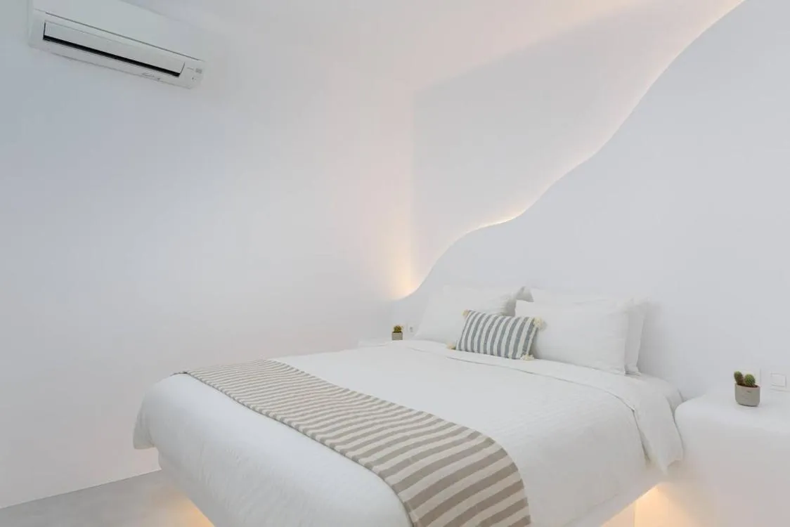 Bed in Koumi Homes Mykonos