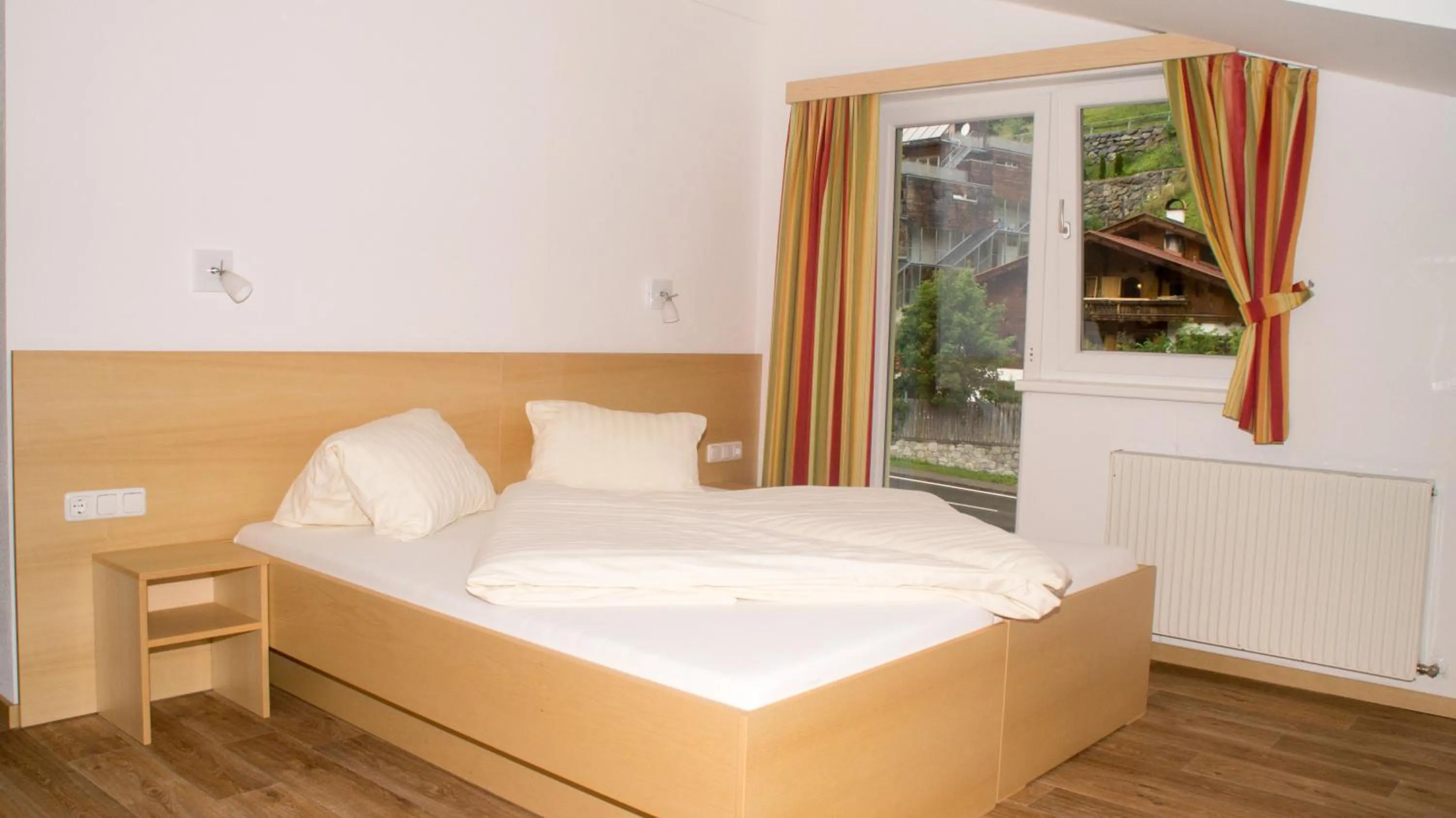 Bed in "Quality Hosts Arlberg" Hotel-Gasthof Freisleben