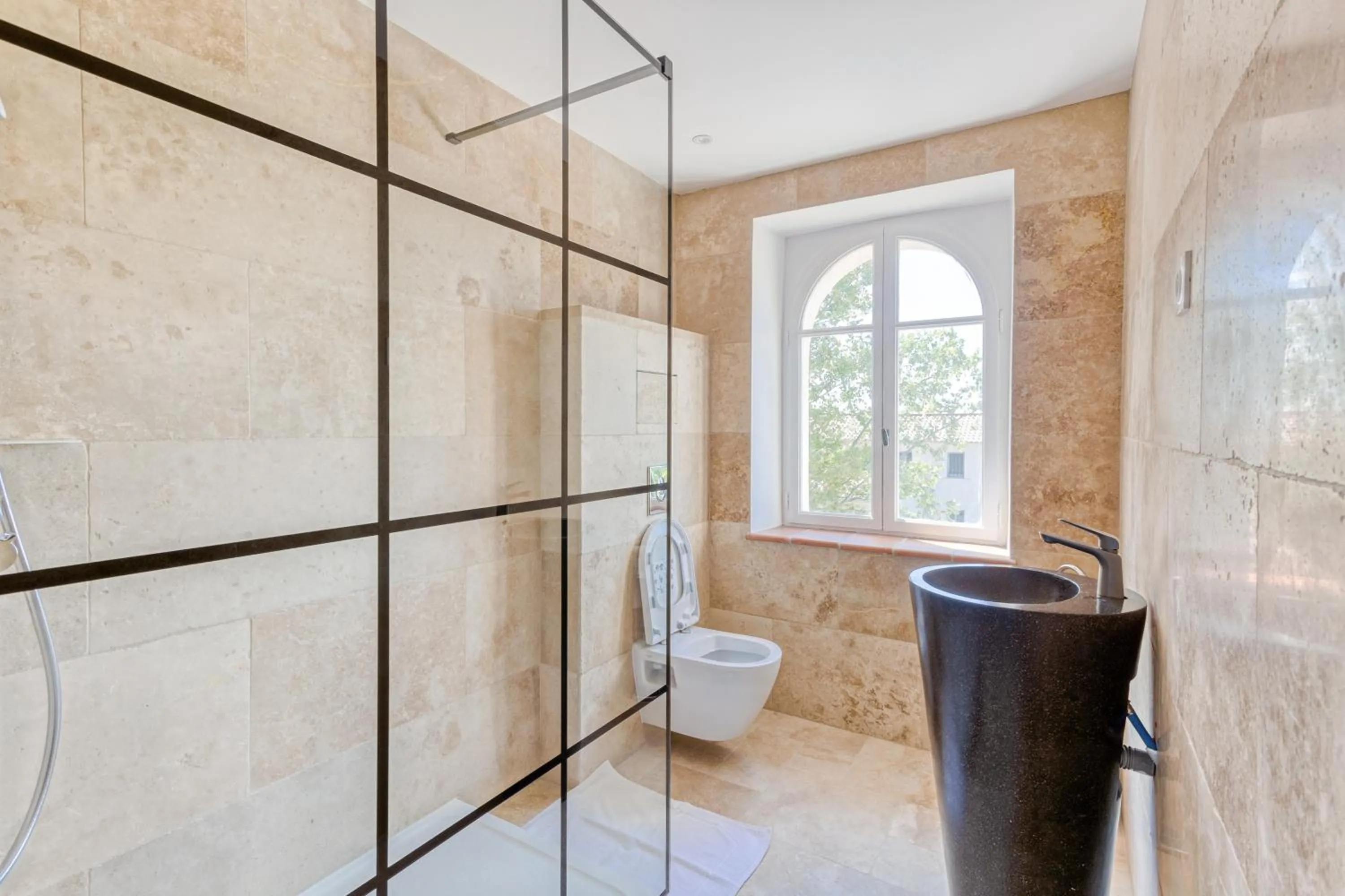 Bathroom in DOMAINE DE LA NERTHE- HOTEL PROVENCE MEDITERRANEE