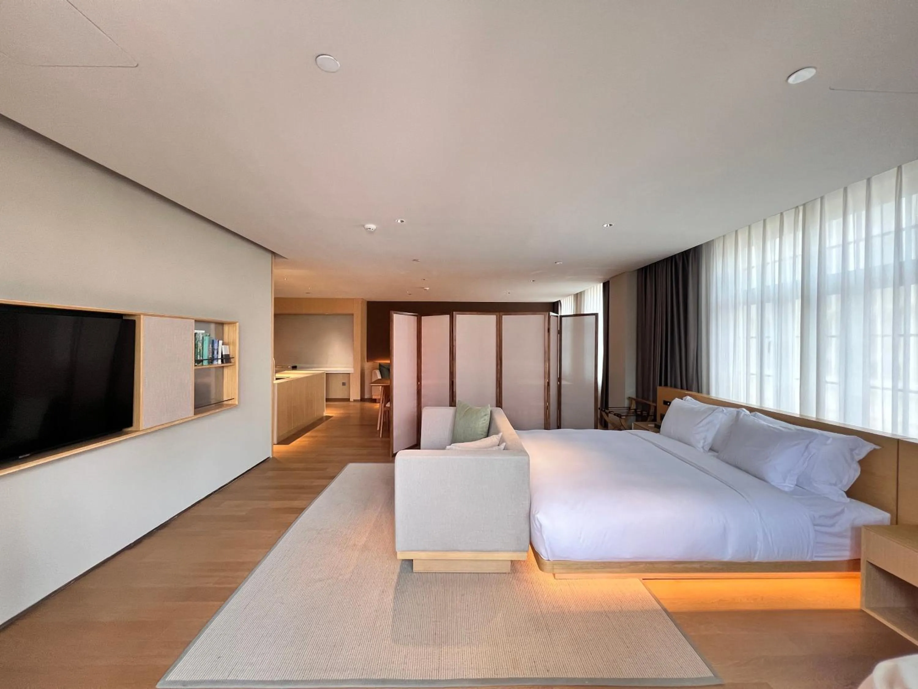 Bed in HOTEL ANDI Townscape Wuhan