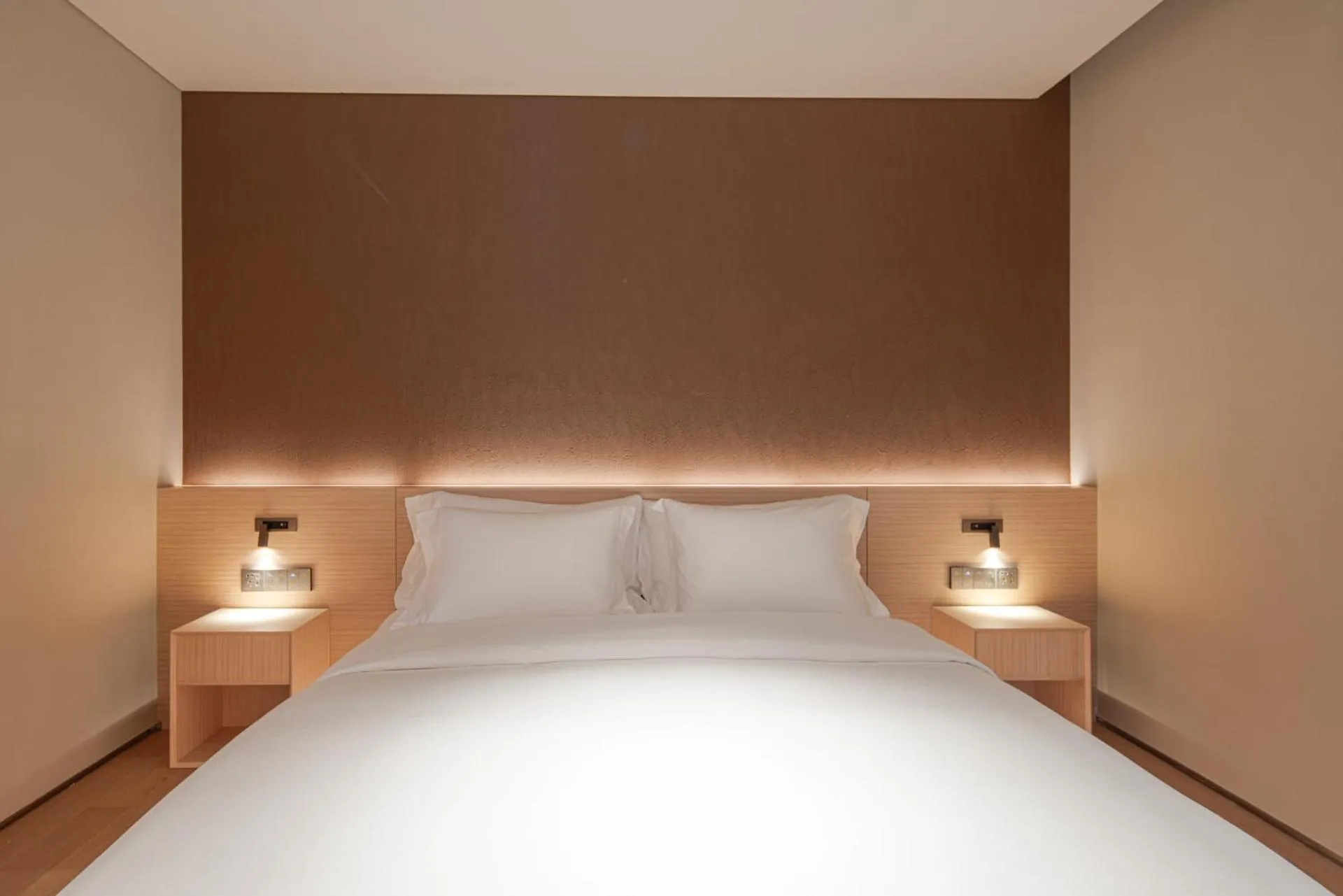 Bed in HOTEL ANDI Townscape Wuhan