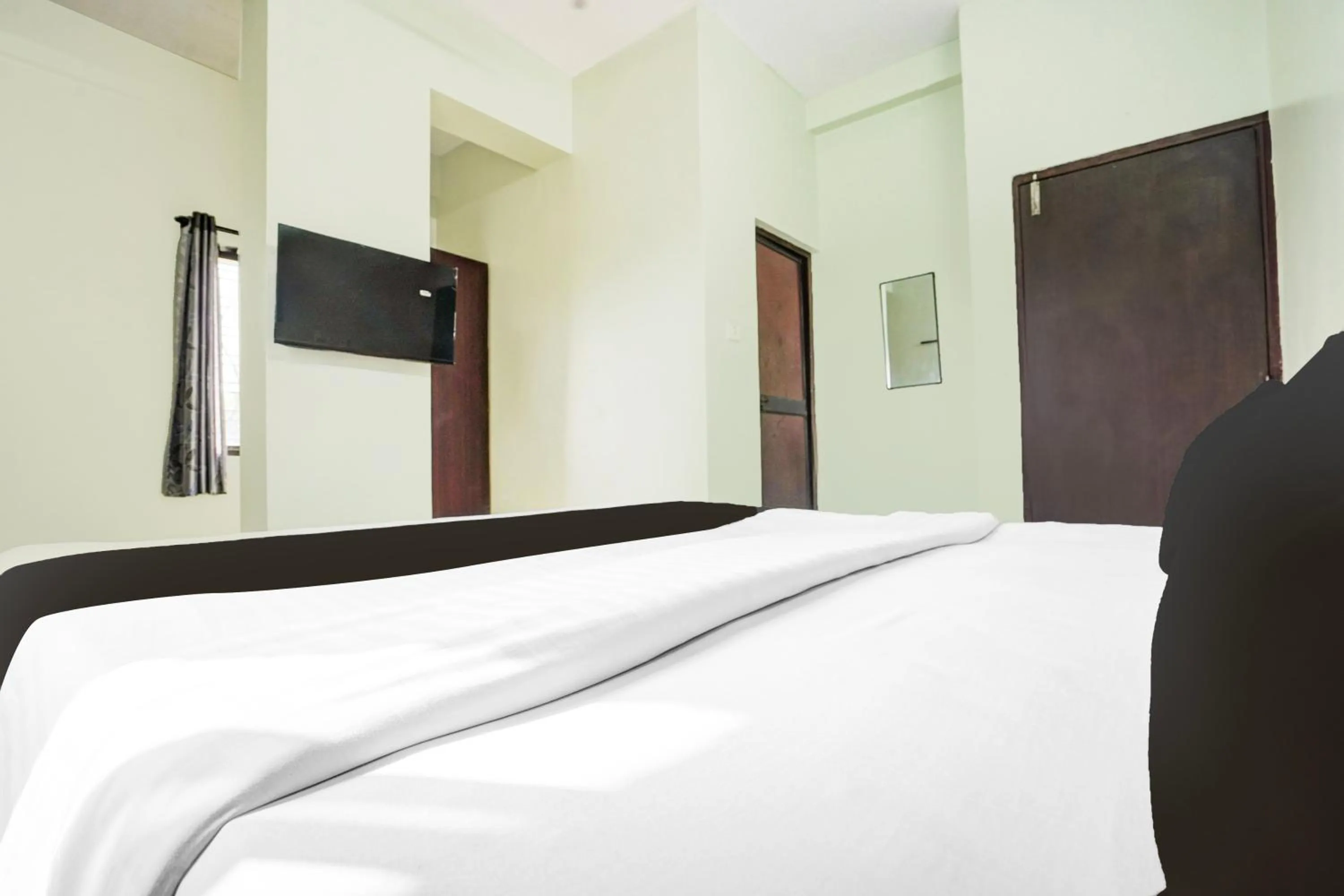 Bedroom, Bed in Super Hotel O Rajendra Nagar Hingna Road