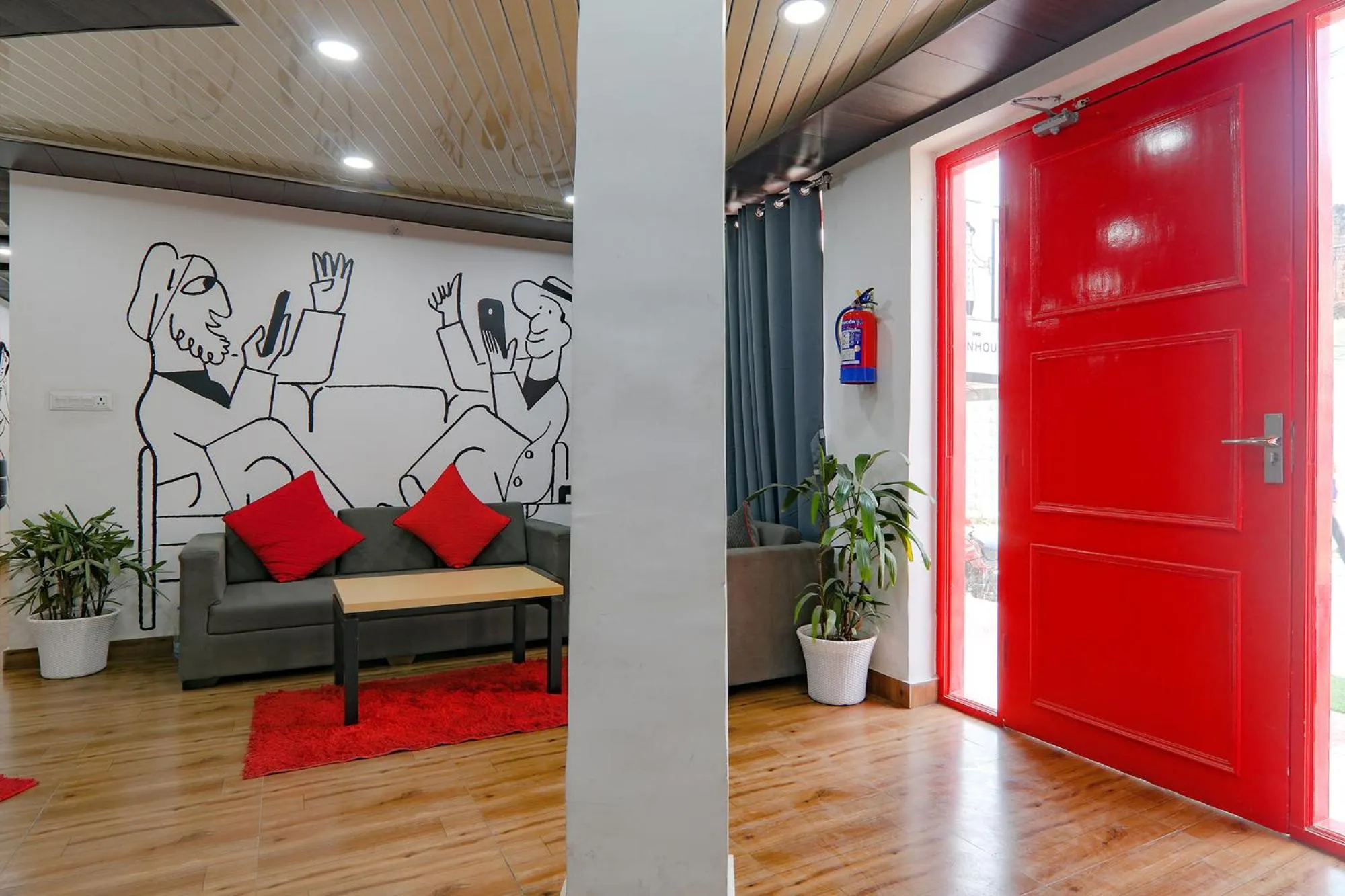 Seating area in FabHotel Super 3 Premium II