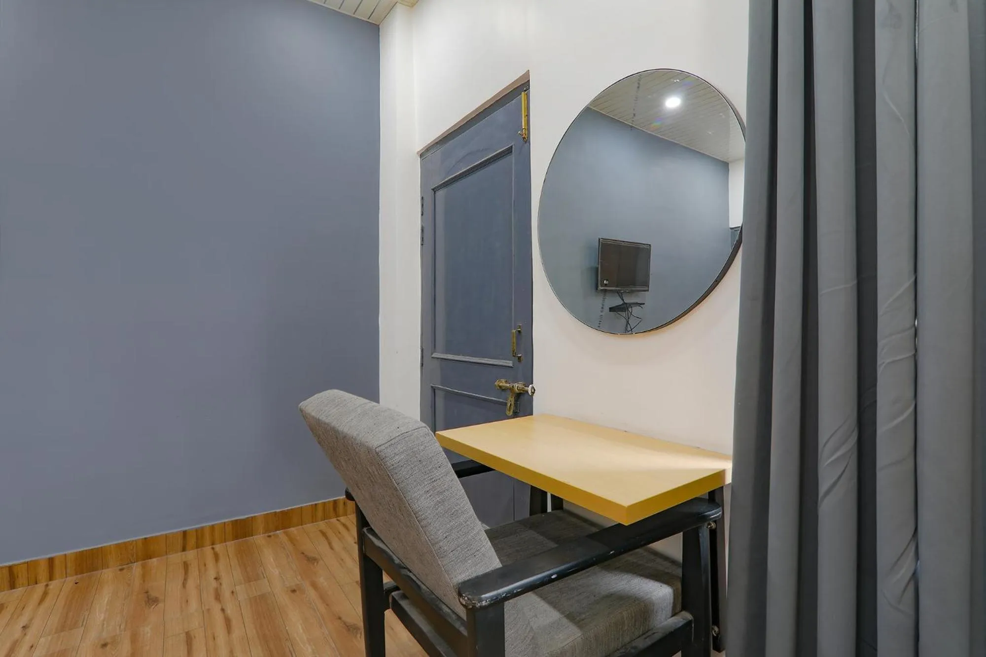 Seating area in FabHotel Super 3 Premium II