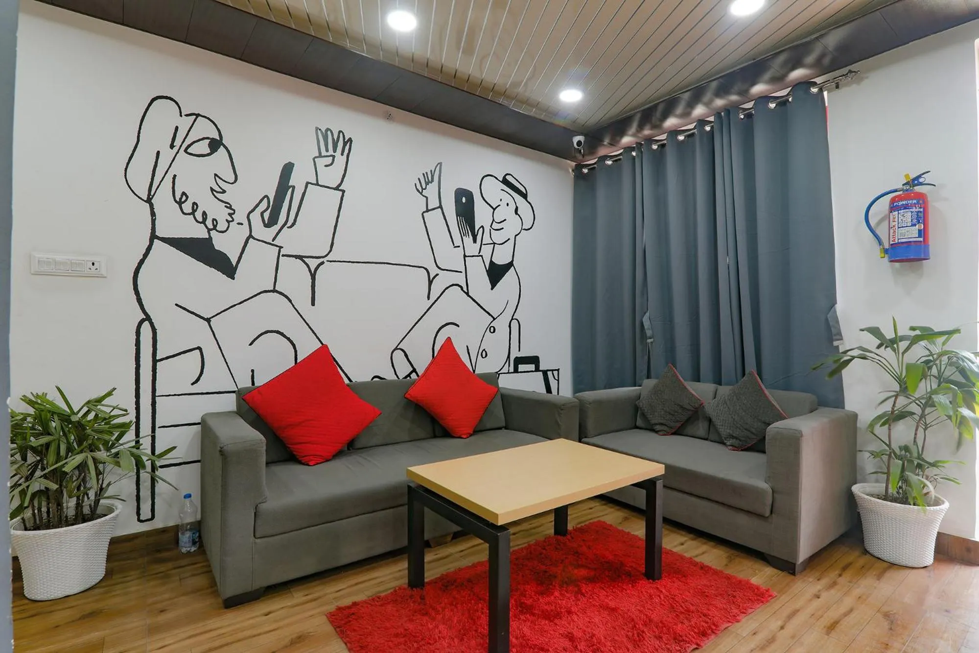 Seating area in FabHotel Super 3 Premium II