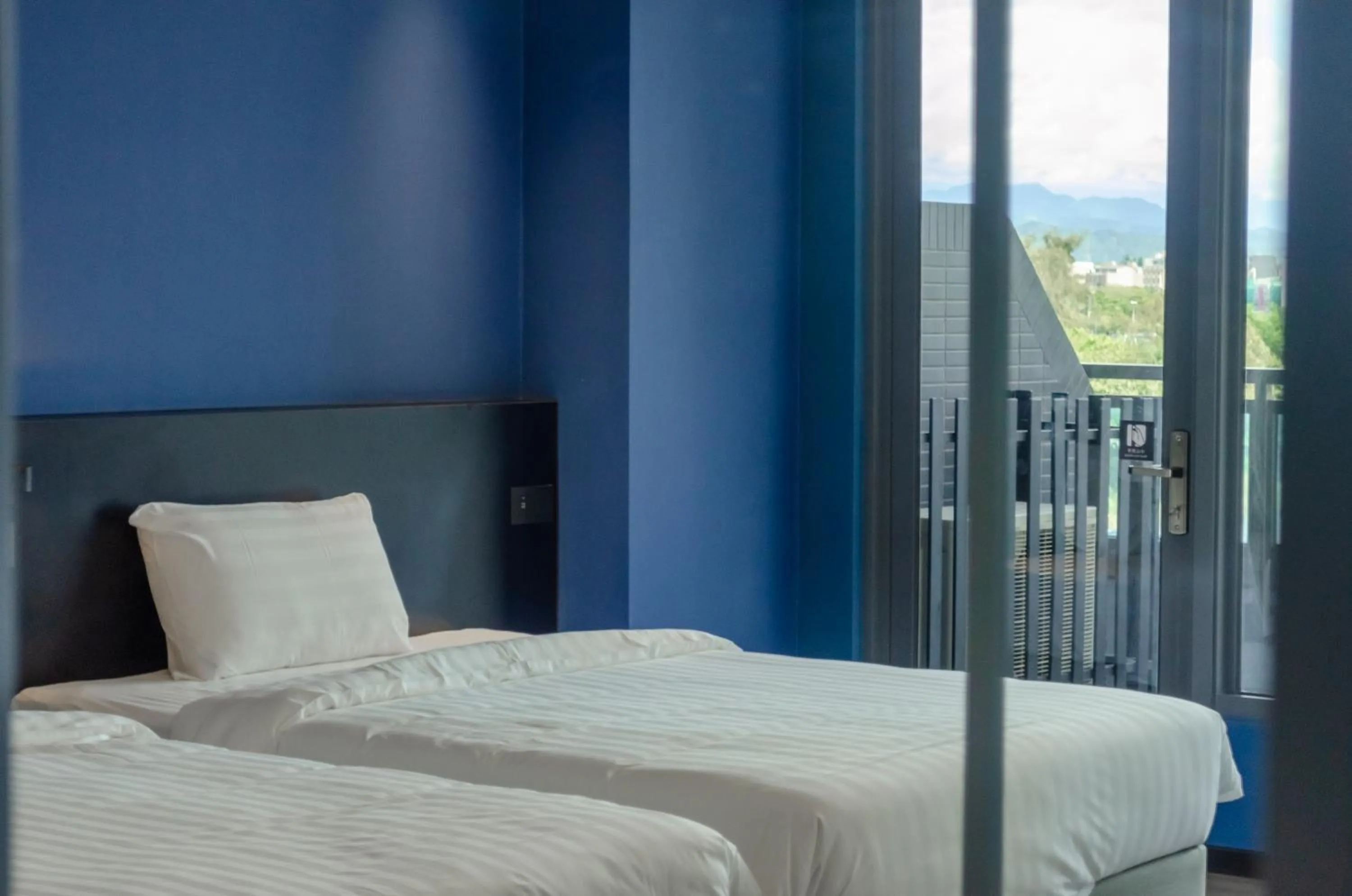 Photo of the whole room, Bed in OA HOTEL Wushih Marina