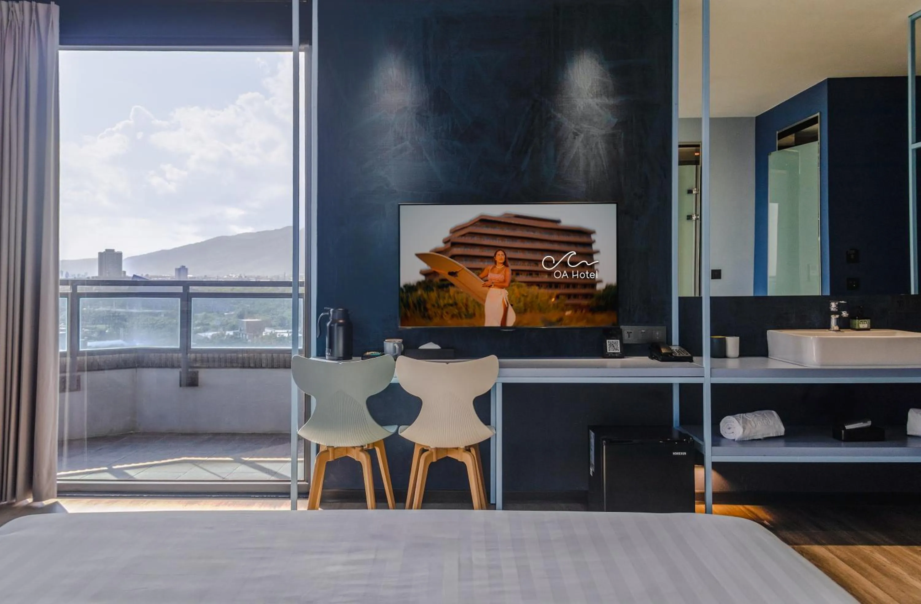 Photo of the whole room, Bed in OA HOTEL Wushih Marina