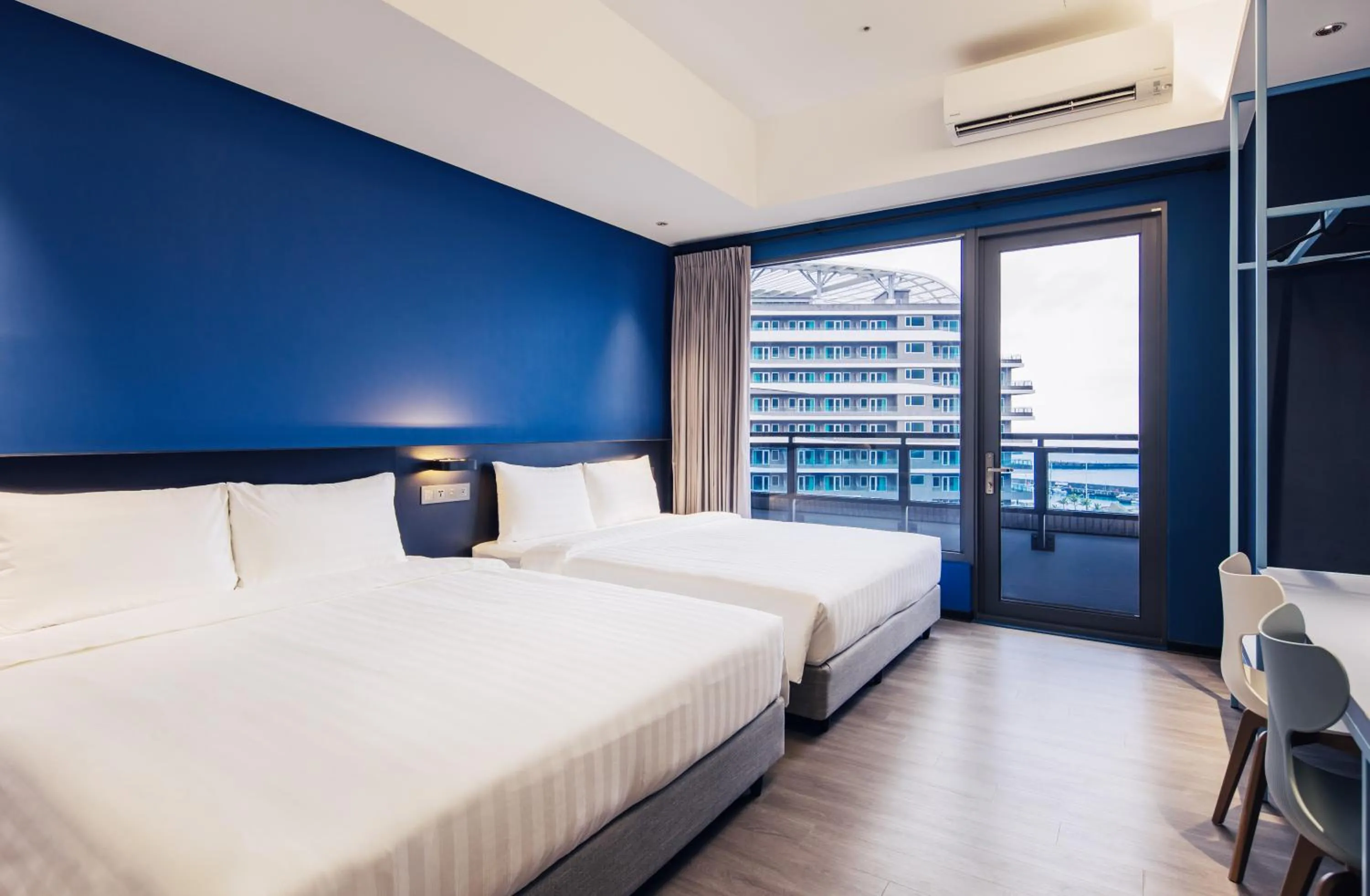 Photo of the whole room, Bed in OA HOTEL Wushih Marina