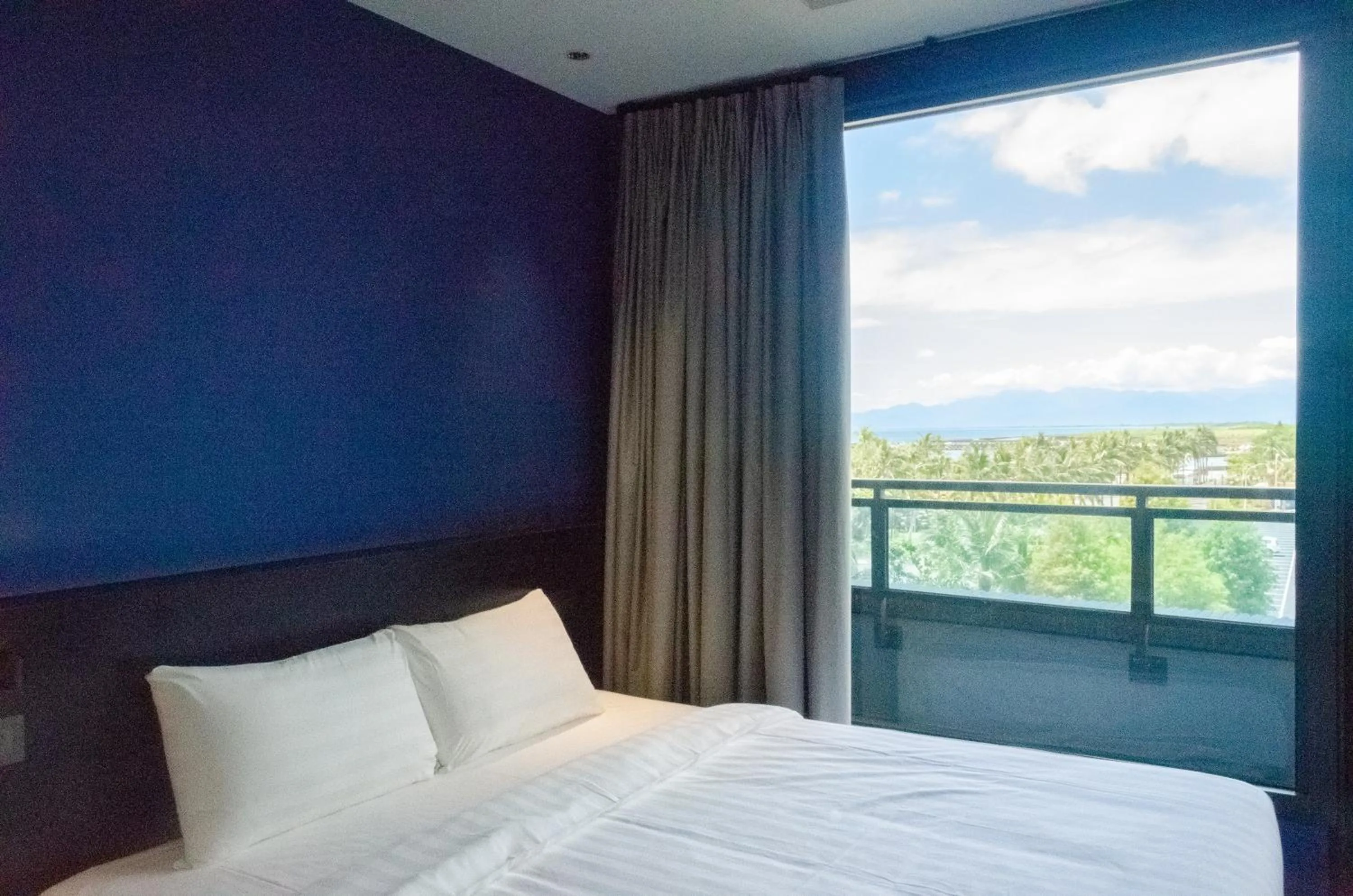 Photo of the whole room, Bed in OA HOTEL Wushih Marina