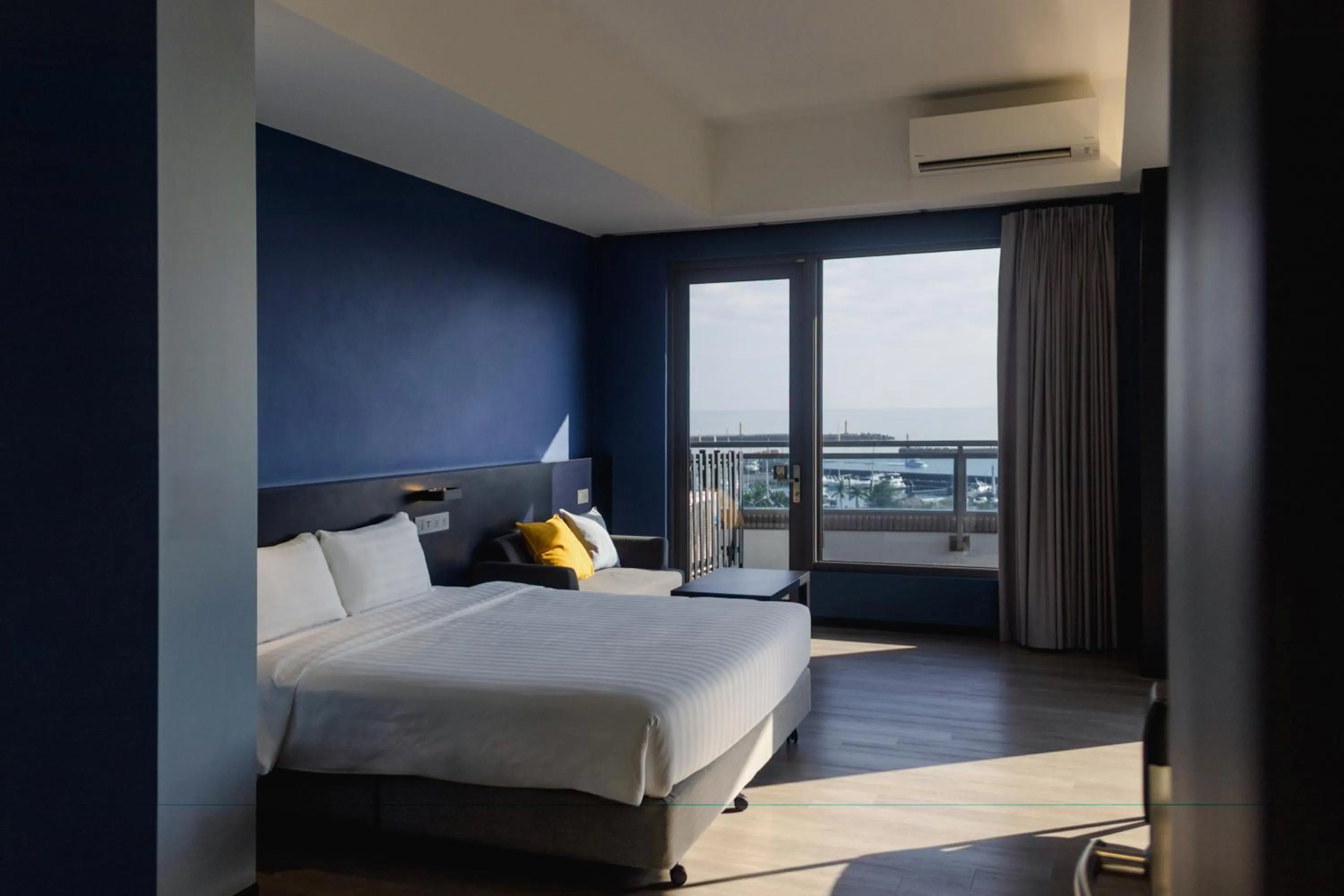 Photo of the whole room, Bed in OA HOTEL Wushih Marina