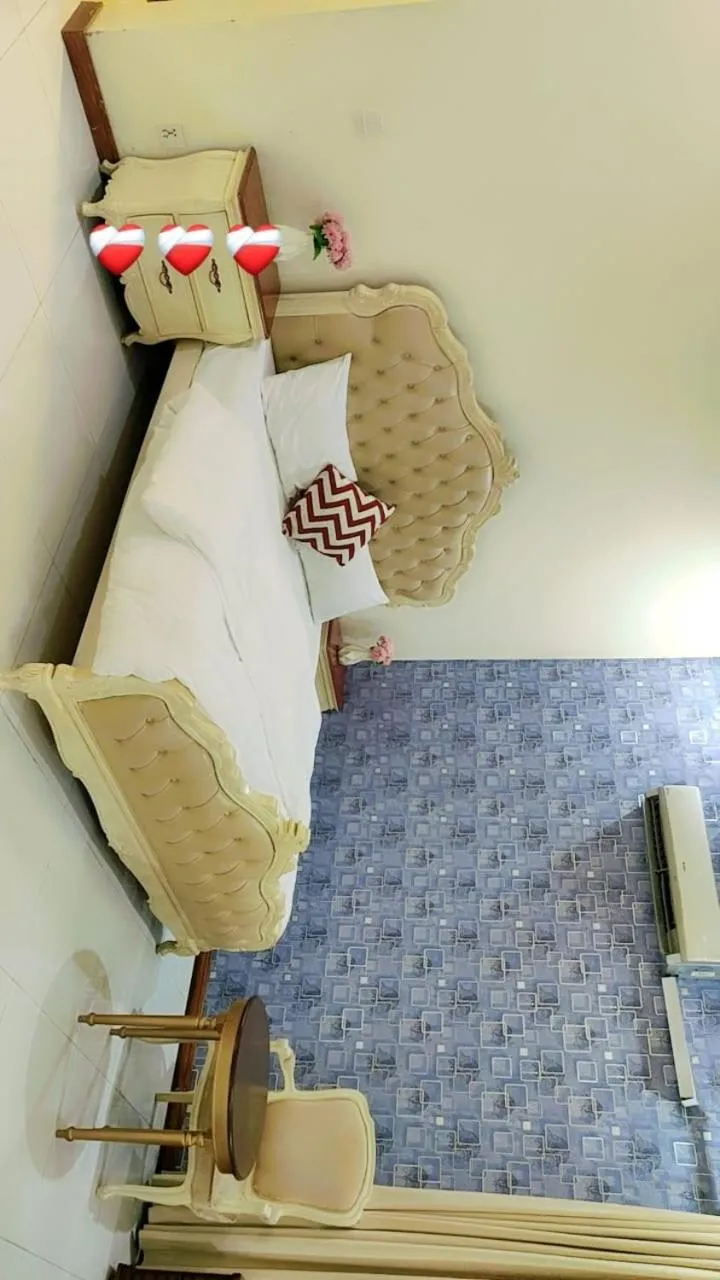 Bed in Comfyinn Guest House