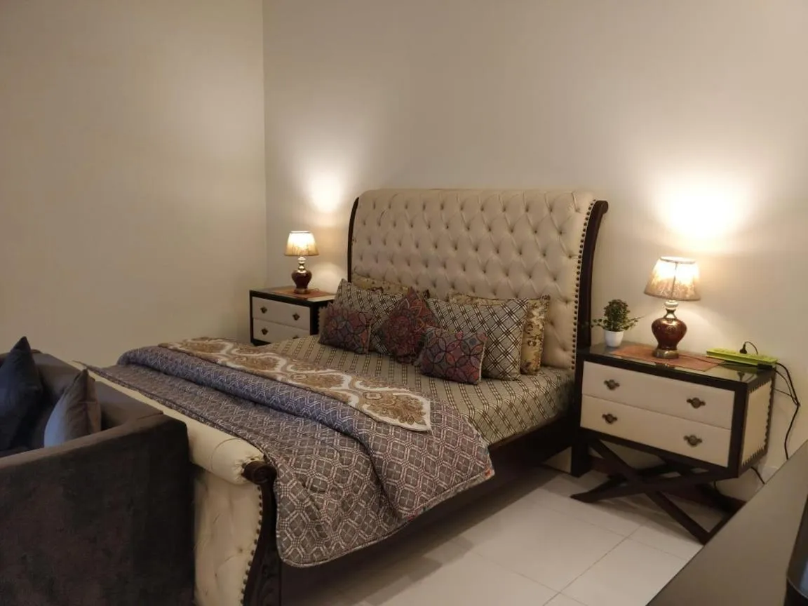 Bed in Comfyinn Guest House