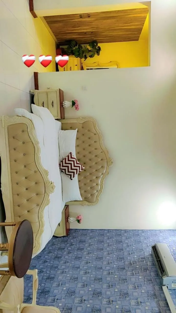 Bed in Comfyinn Guest House