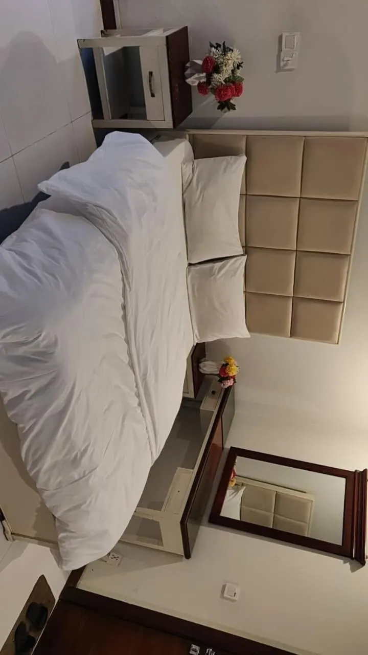 Bed in Comfyinn Guest House